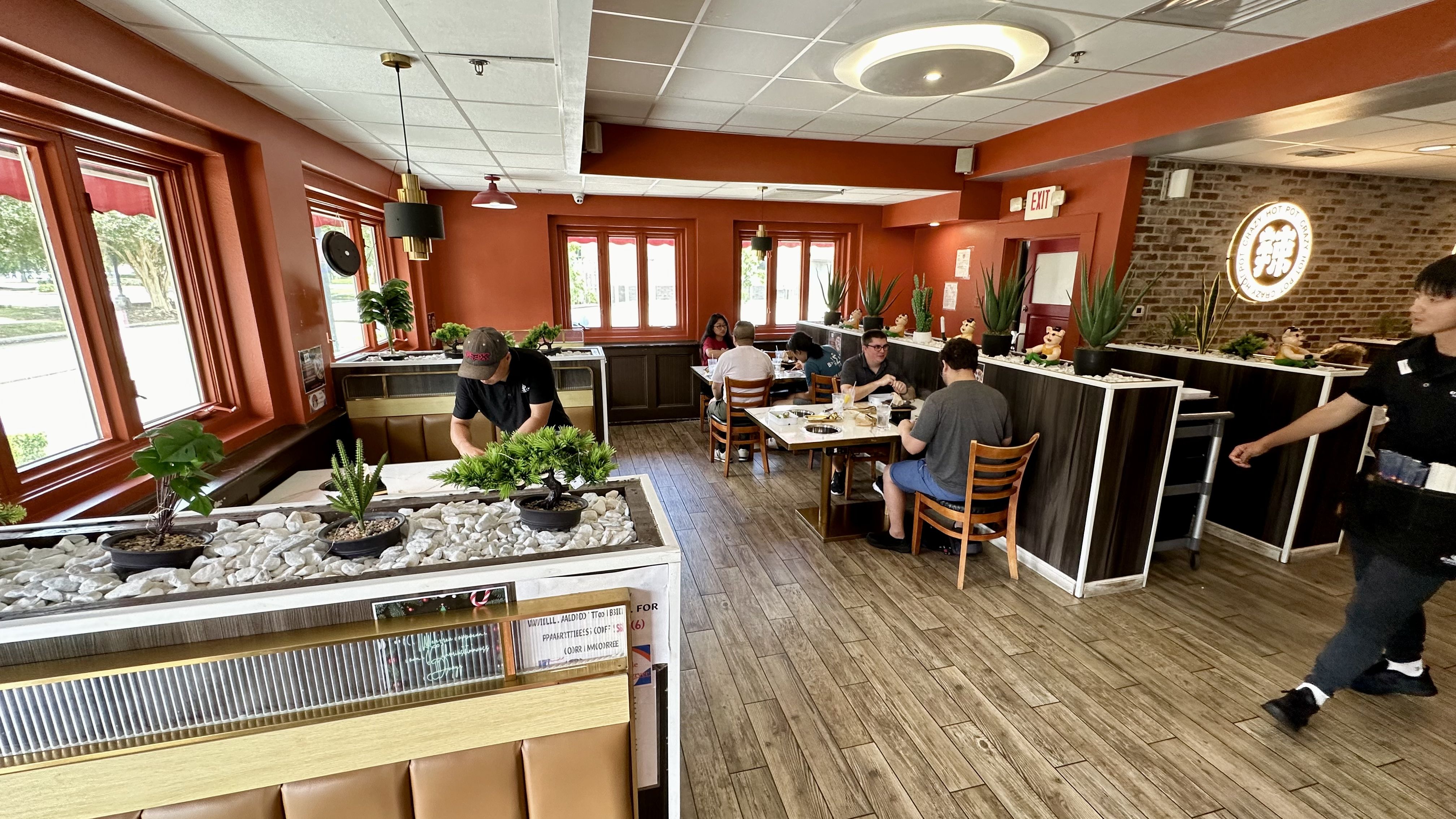 Photo shows tables inside the restaurant.