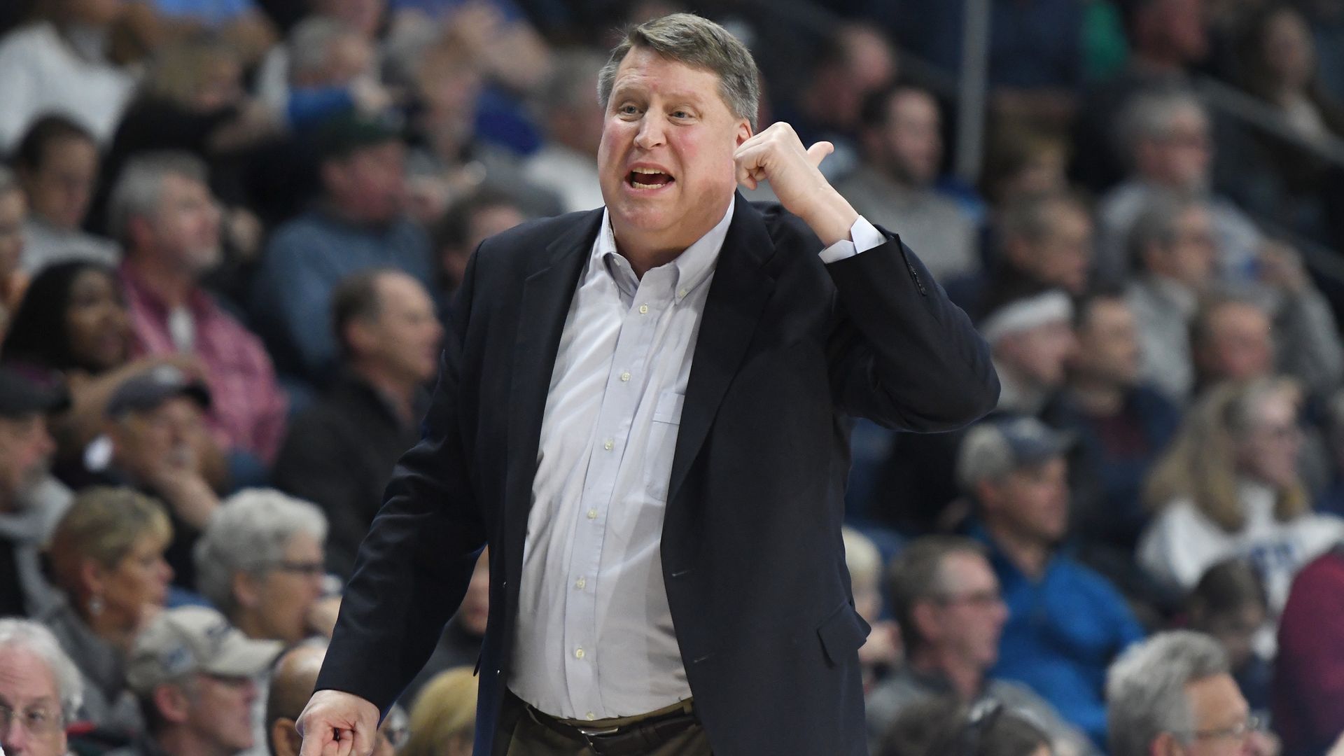 Man coaching on court at a basketball game in Norfolk, VA