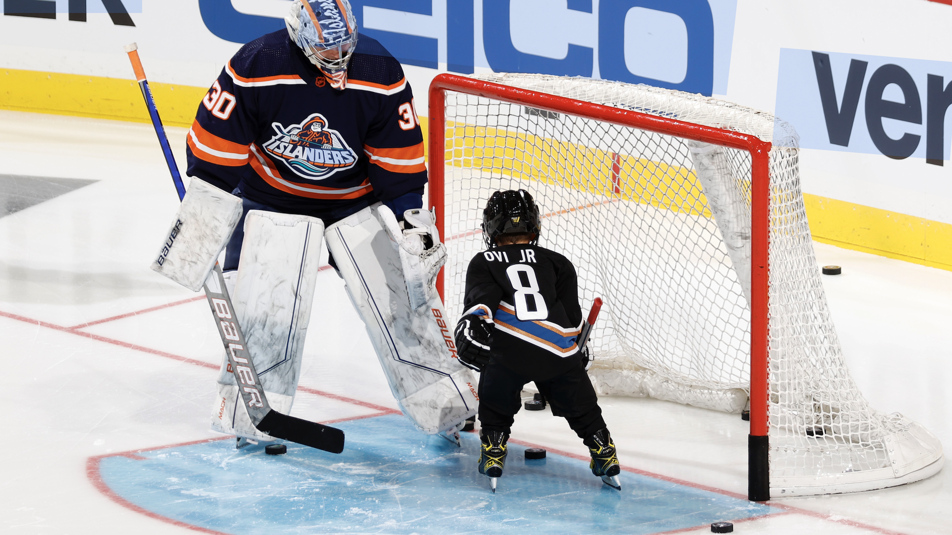 Sergei Ovechkin, son of Alex Ovechkin, talks with Ilya Sorokin prior to the 2023 NHL All-Star Skills Competition 