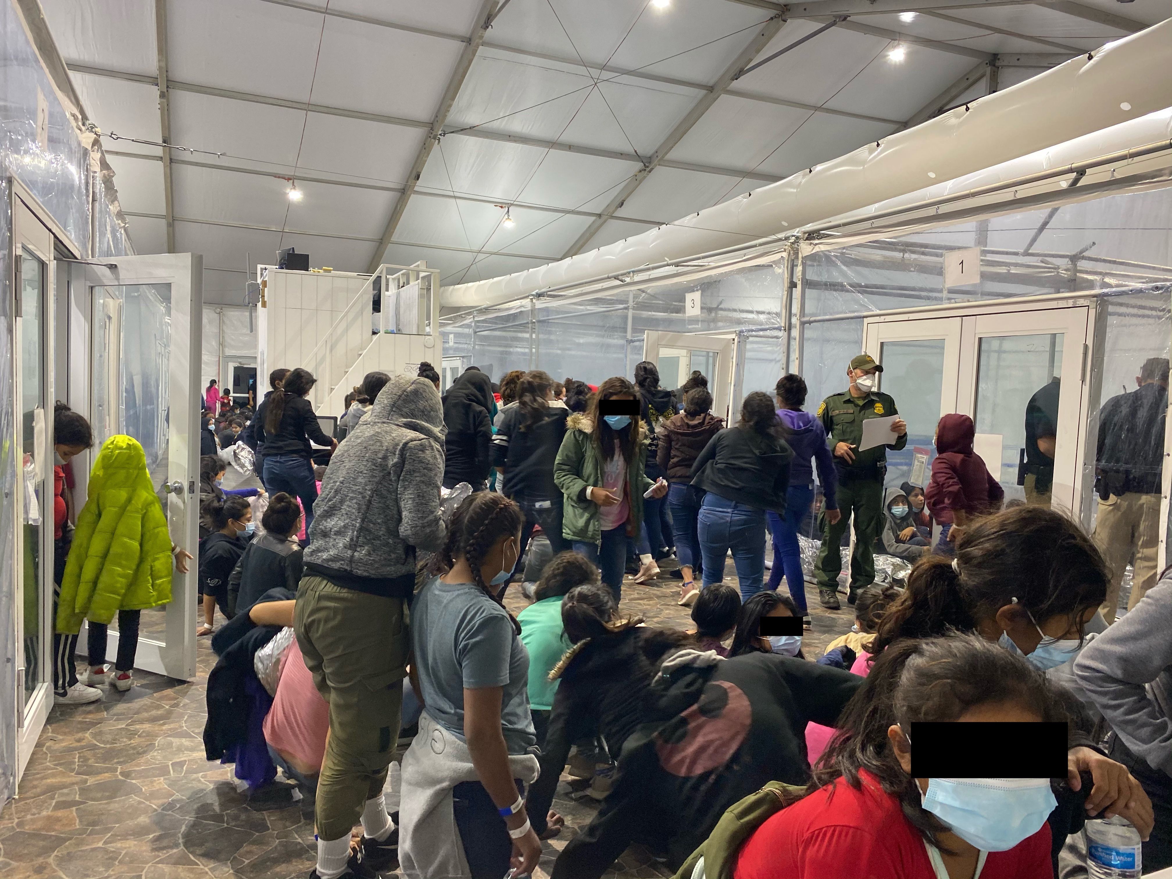 Migrants crowded in border facility in Donna, Texas