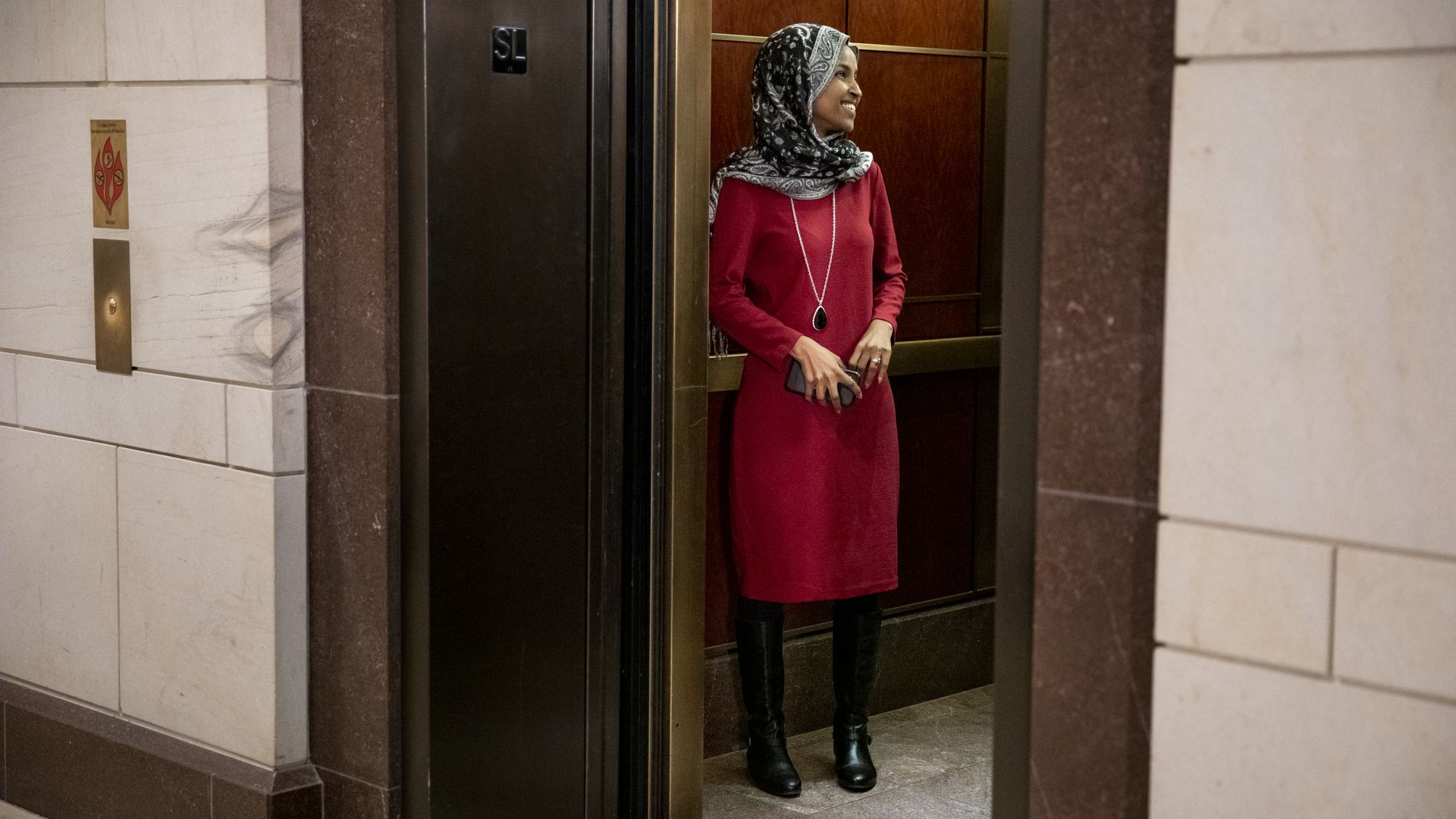 Rep. Ilhan Omar is seen standing in an elevator in the U.S. Capitol.