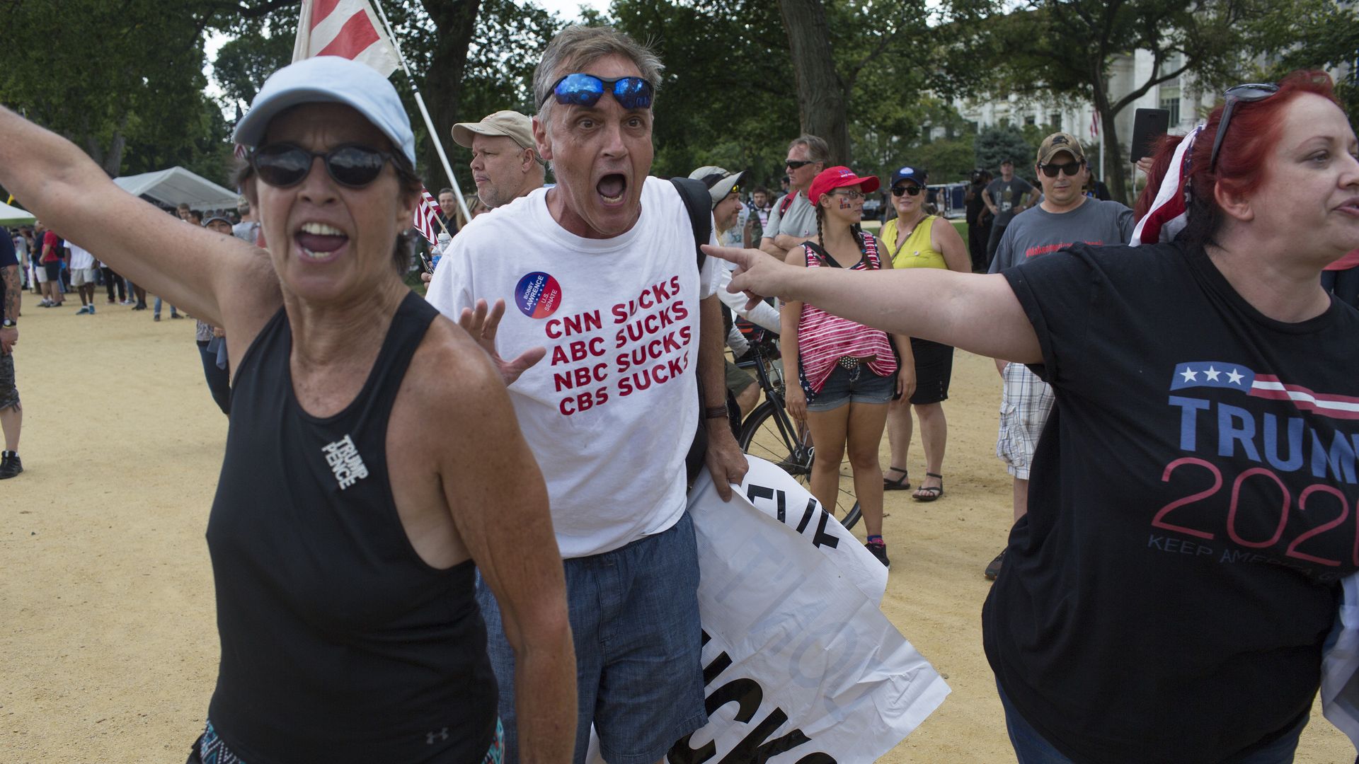 Supporters of U.S. President Donald Trump scream at the media as they gather for what was billed as 'The Mother of all Rallies' on September 16, 2017