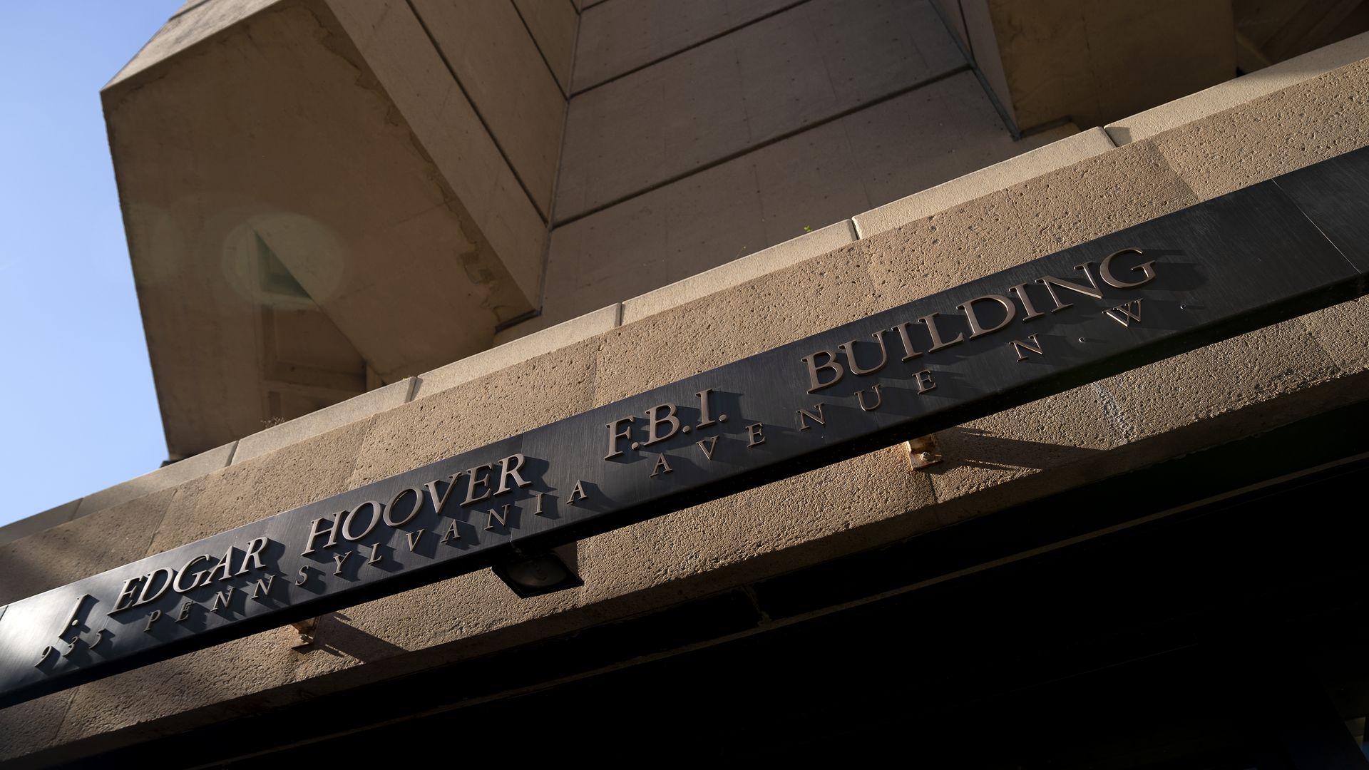 Photo looking up at the exterior of the J. Edgar Hoover FBI Building