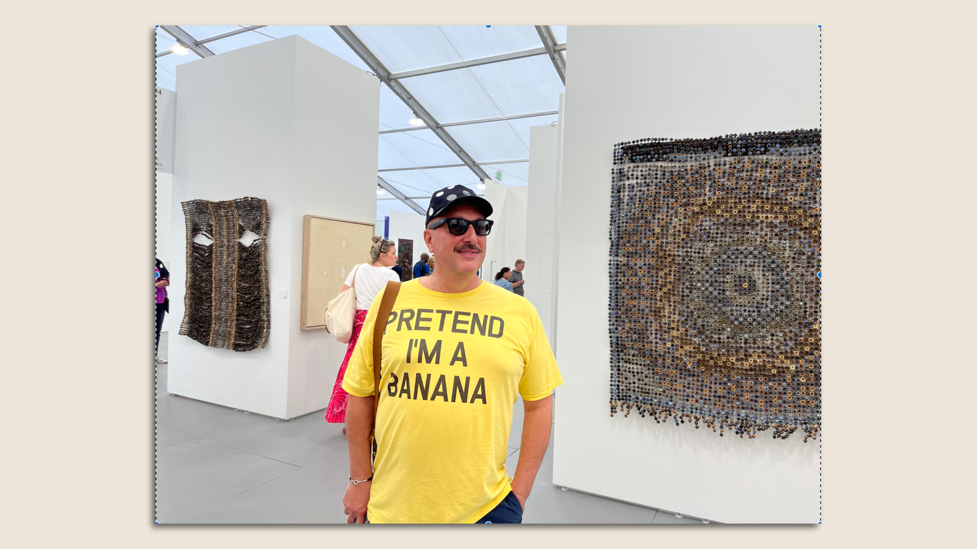 A man wears a "Pretend I'm a Banana" t-shirt