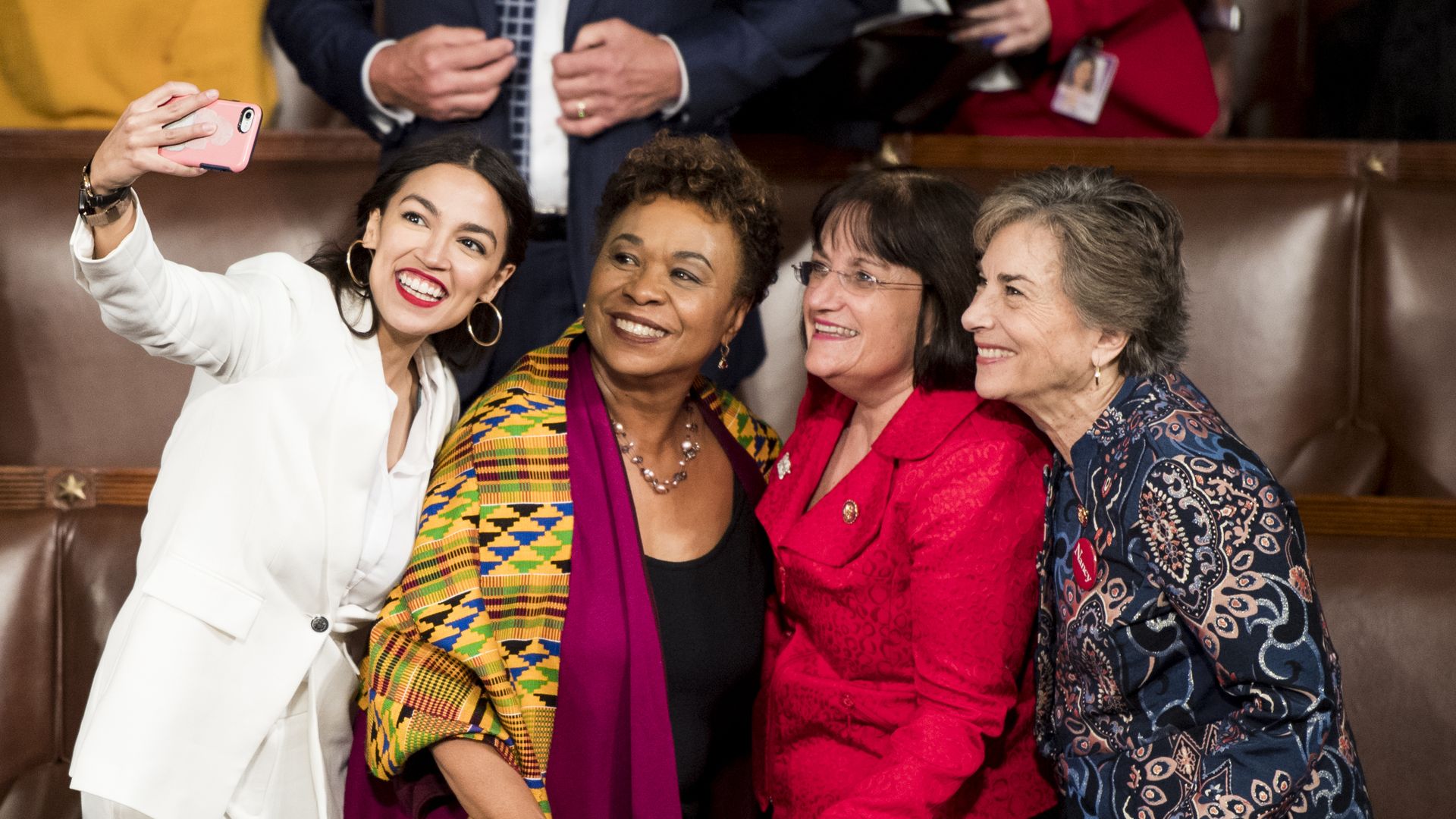 Freshman Reps. from left, Alexandria Ocasio-Cortez, D-N.Y., Barbara Lee, D-Texas, Annie Kuster, D-N.H., and Jan Schakowsky, D-Ill., take a selfie on the House floor before the start of the election