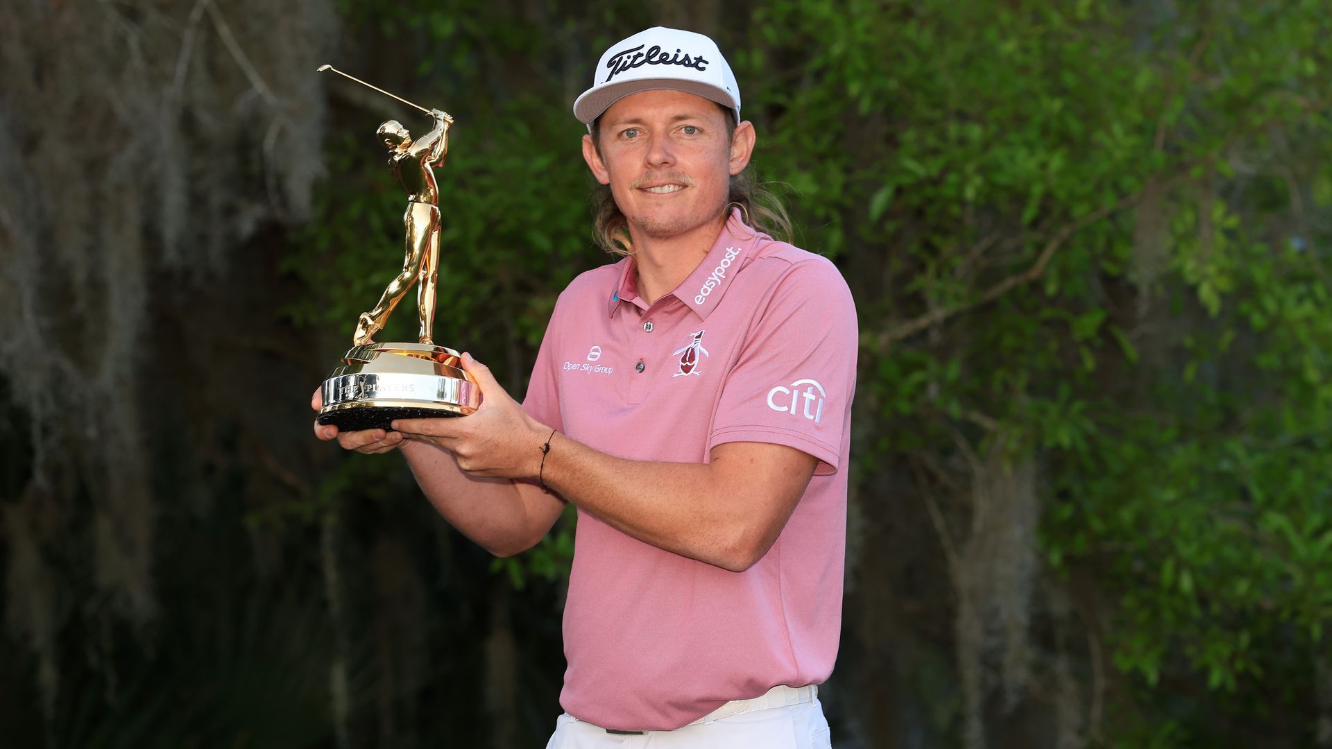 Cameron Smith hold the Players Championship trophy