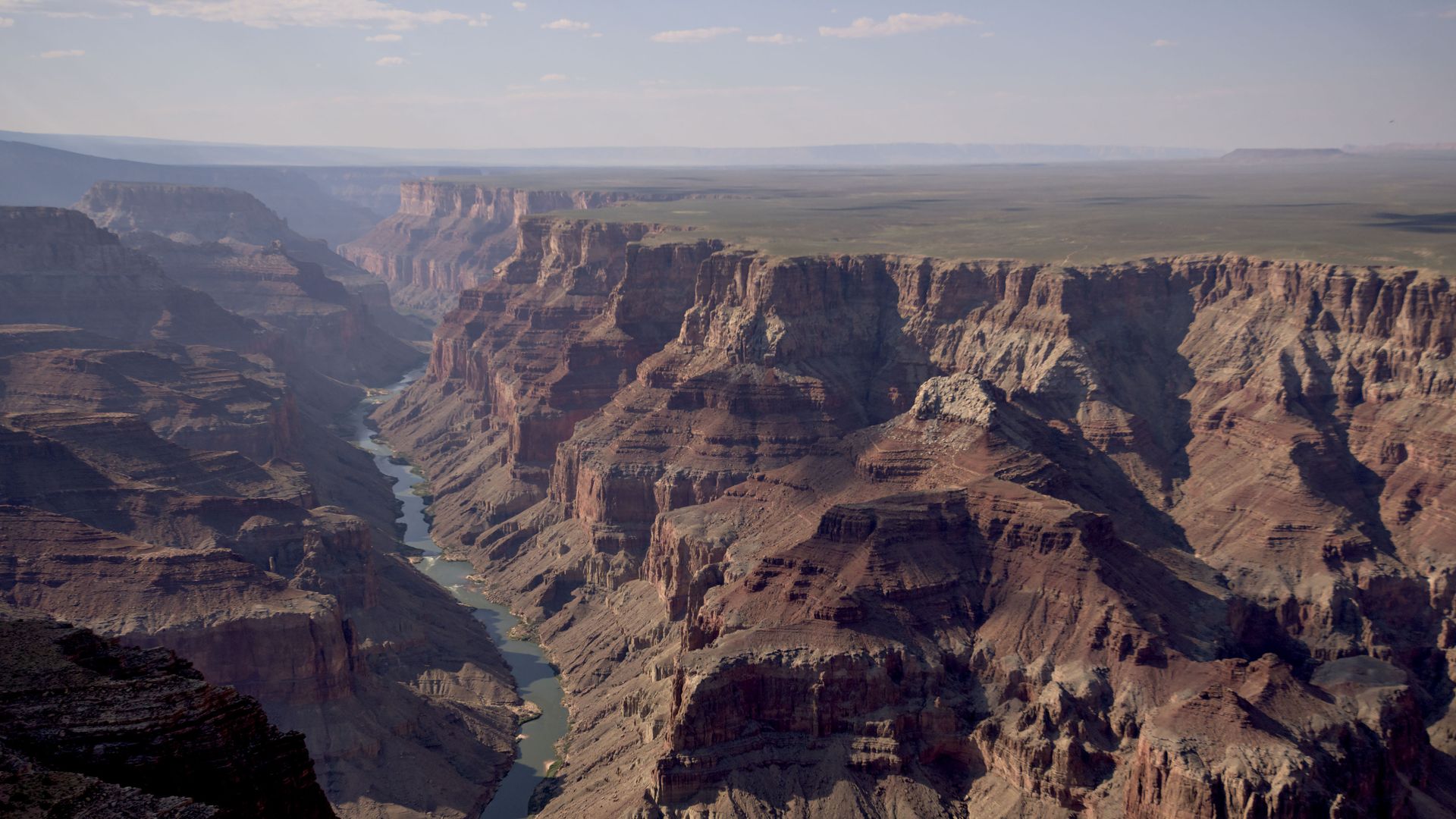 An overhead view of the Colorado River flowing through the Grand Canyon. 