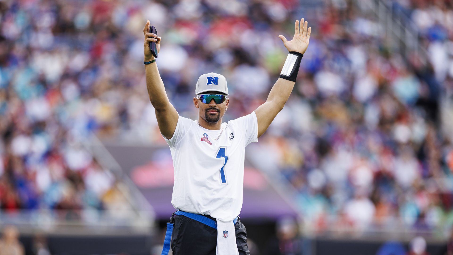 Jalen Hurts tosses a touchdown for the Philly school district with a $200,000 donation for air conditioners. 