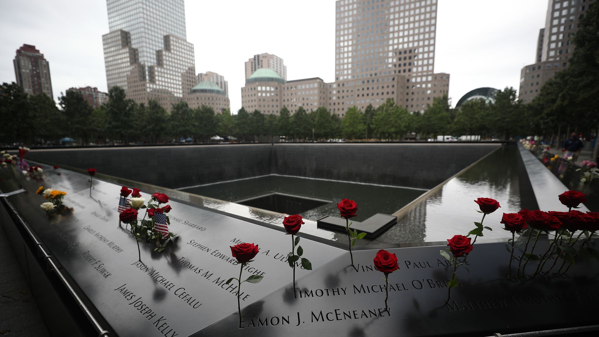 Roses are placed on the 9/11 memorial 