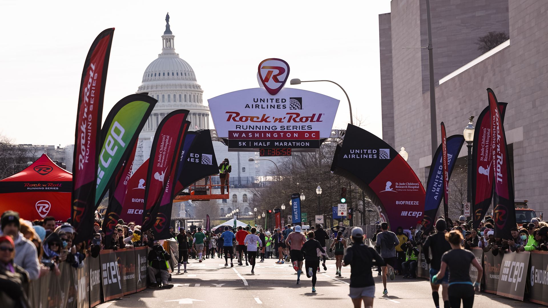 Runners crossing the finish line of the Rock & Roll Half-Marathon.