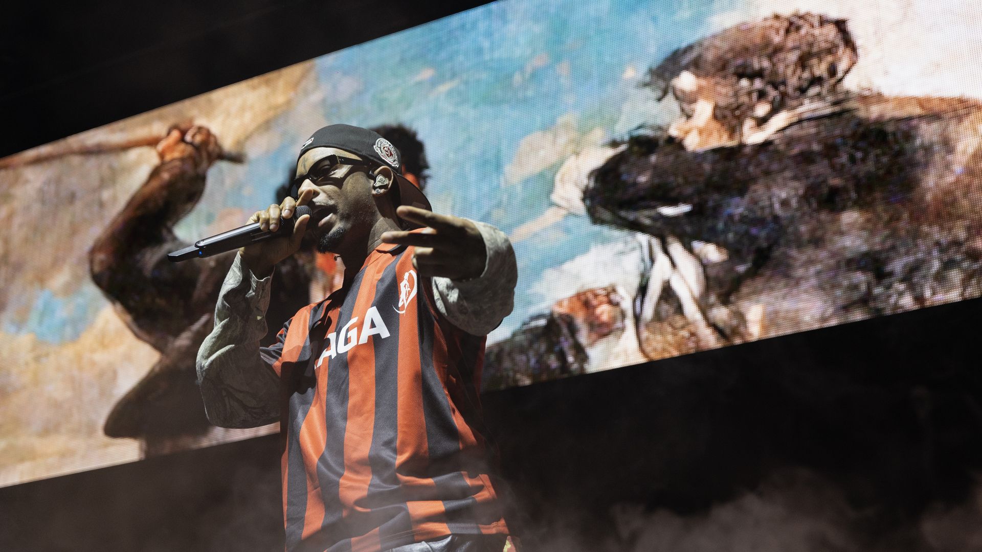 21 Savage performing on stage.