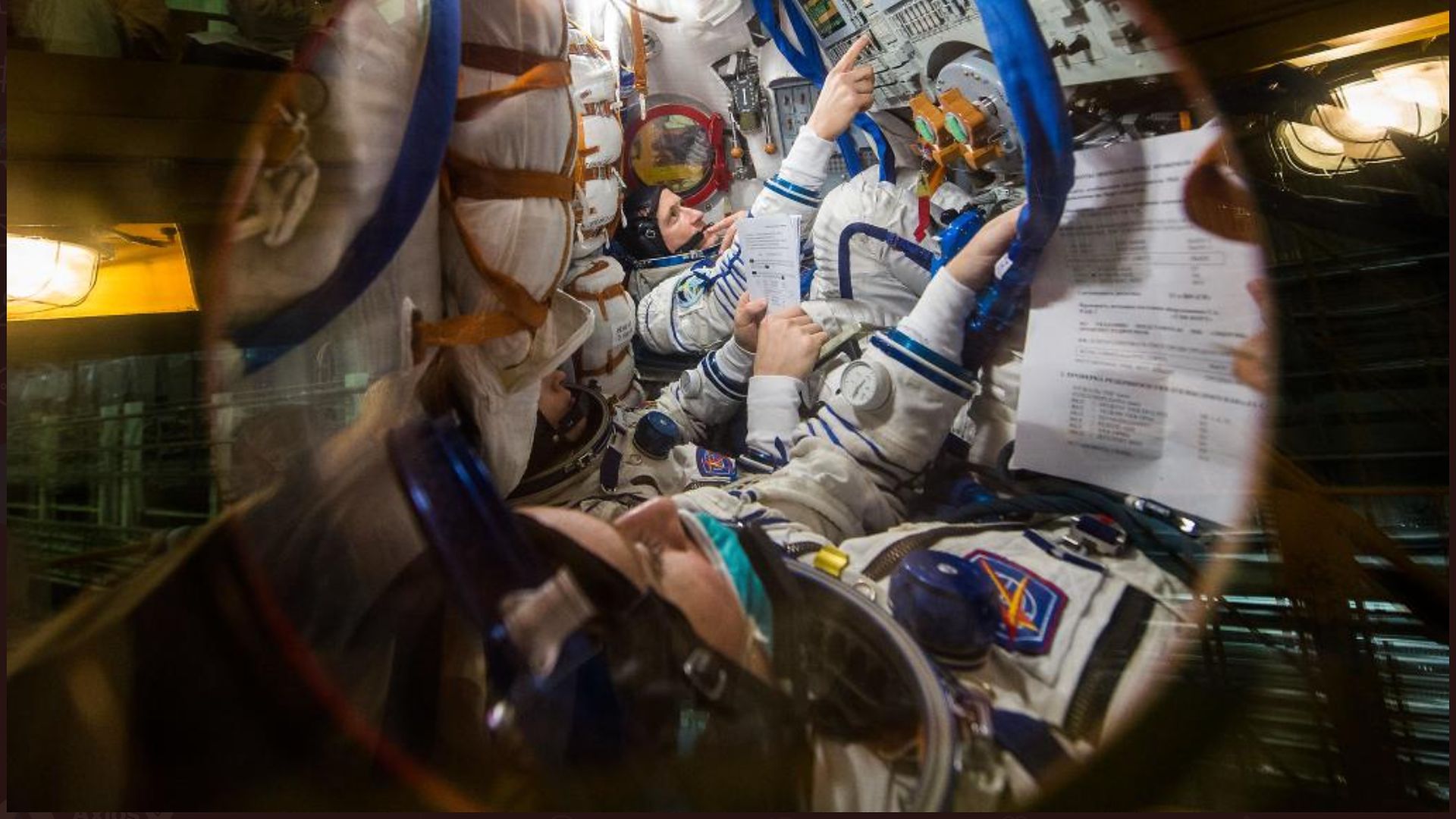 NASA astronaut Kate Rubins and Russian cosmonauts Sergey Ryzhikov and Sergey Kud-Sverchkov aboard the spacecraft