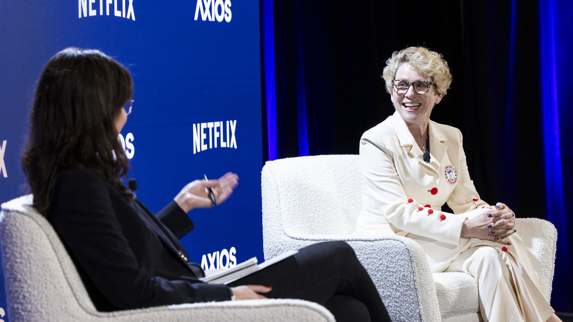Image of Rep. Chrissy Houlahan (D-Pa.) on stage at an Axios event