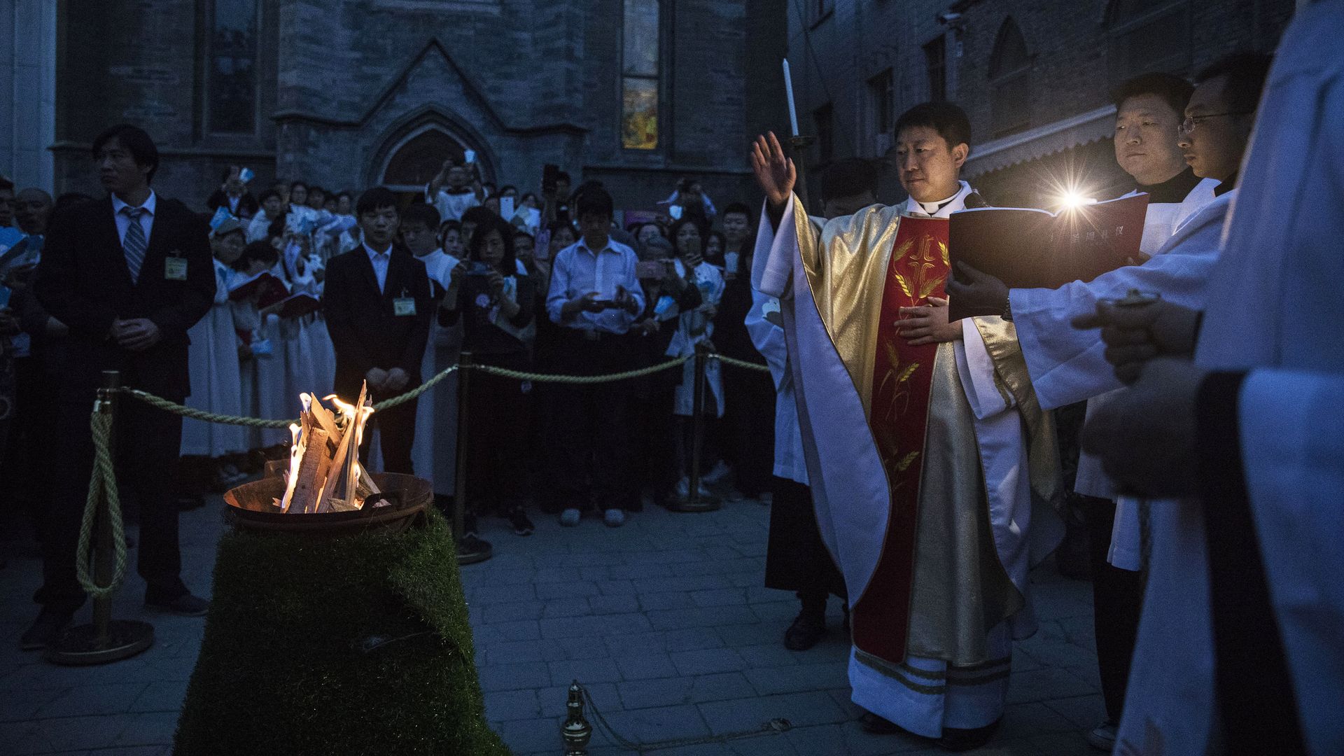 A Chinese bishop saying Easter mass outside in 2017