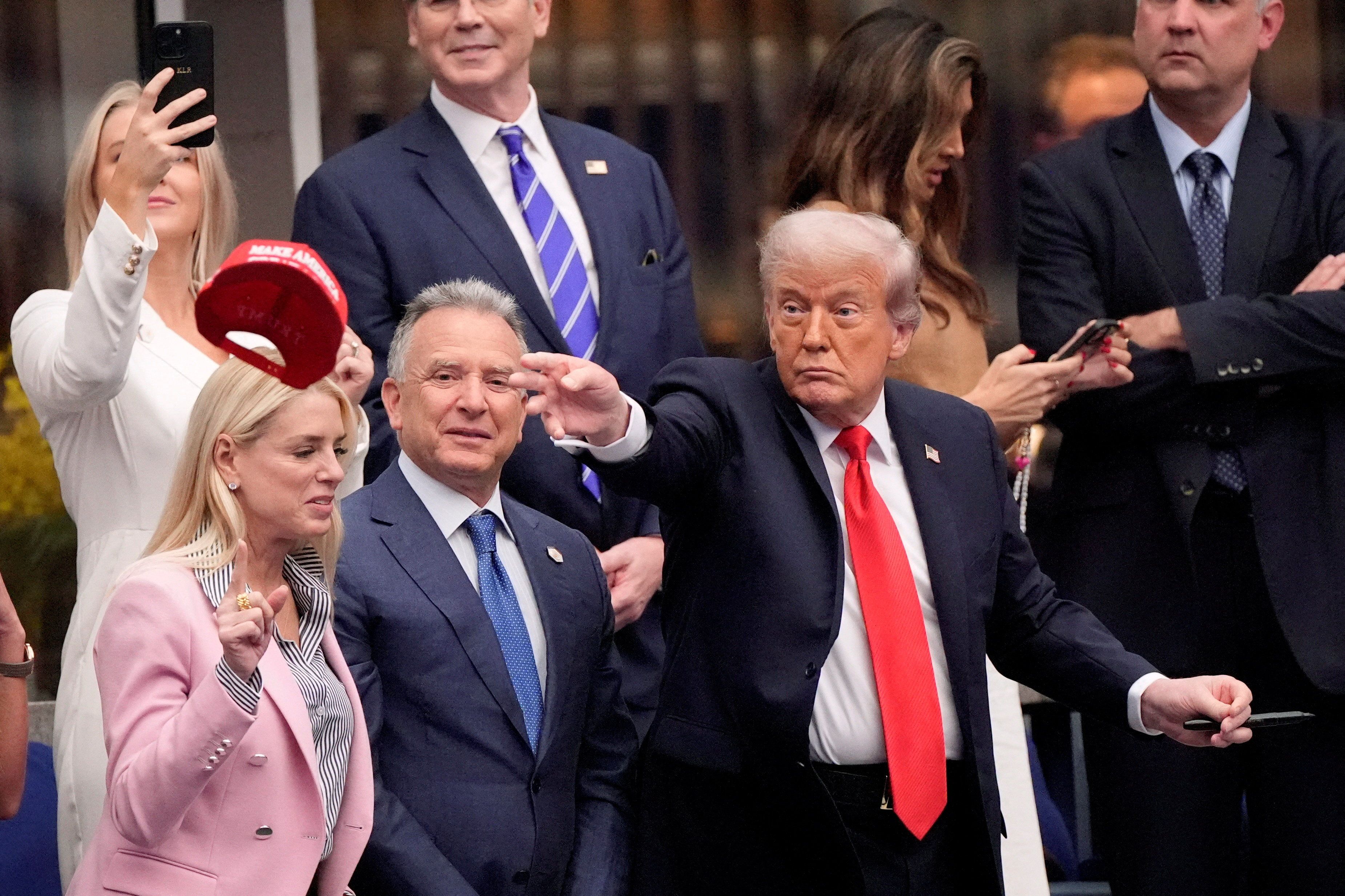 President Trump throws a MAGA hat after yesterday's U.S. Open men's final. 
