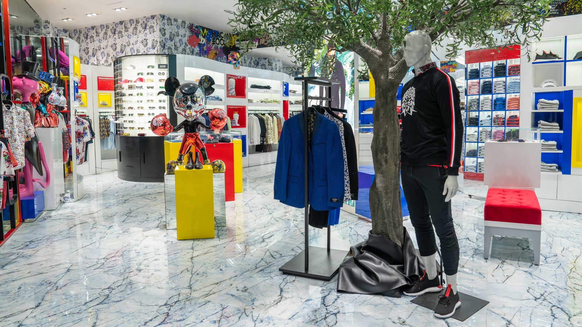 One of fashion brand Maceoo's stores features bright lighting and vivid colors to showcase its merchandise.