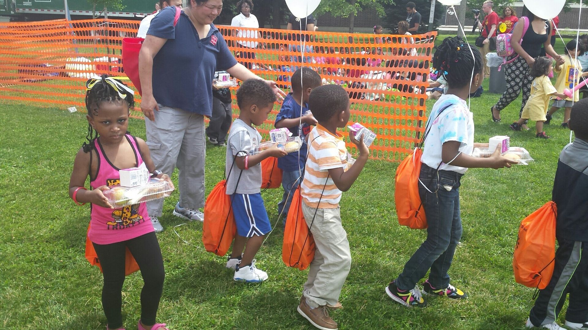 Photo of kids at a park event 