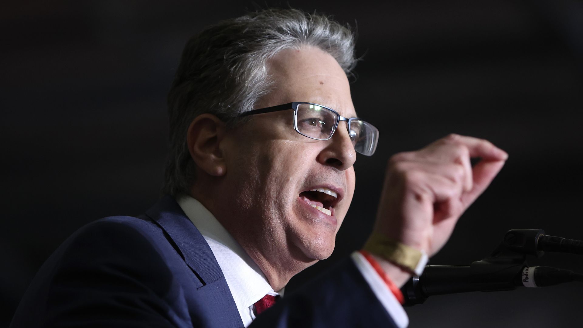 Matthew DePerno, who is running for the Michigan Republican party's nomination for state attorney general, speaks at a rally hosted by former President Donald Trump on April 02.
