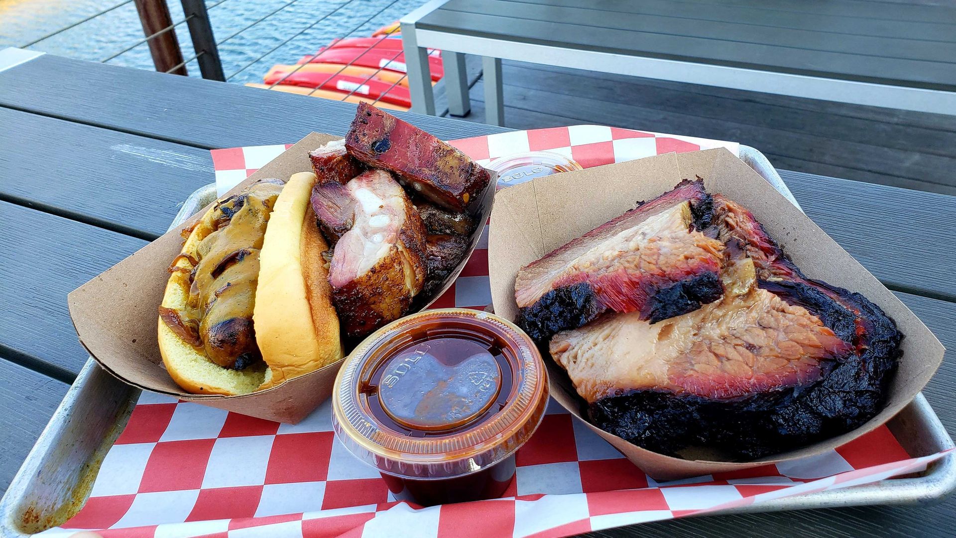 Rib tips and links and brisket in a basket