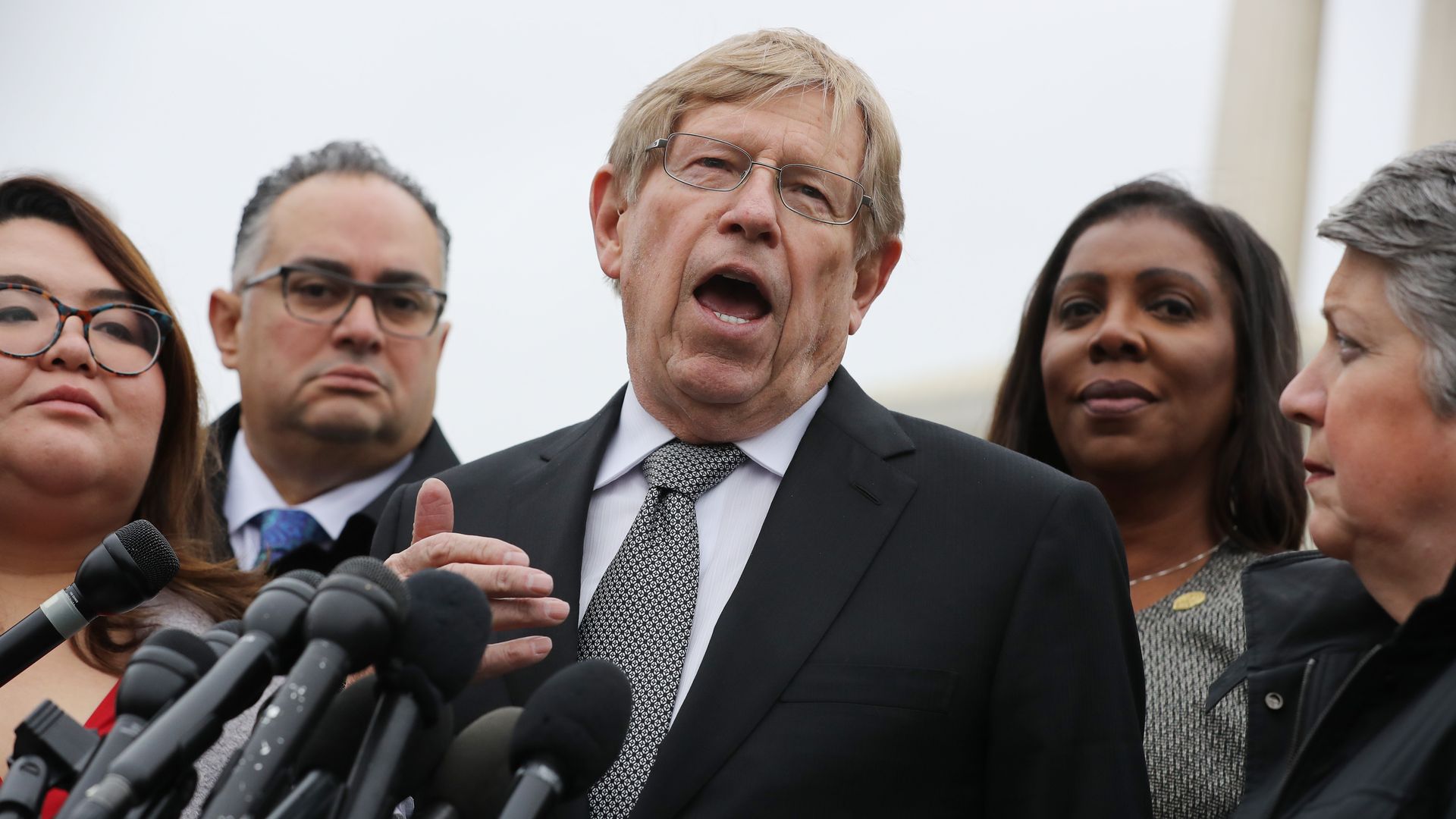 Lawyer Ted Olson (C) talks to reporters with New York State Attorney General Letitia James (2nd R) and former Homeland Security Secretary Janet Napolitano (R).