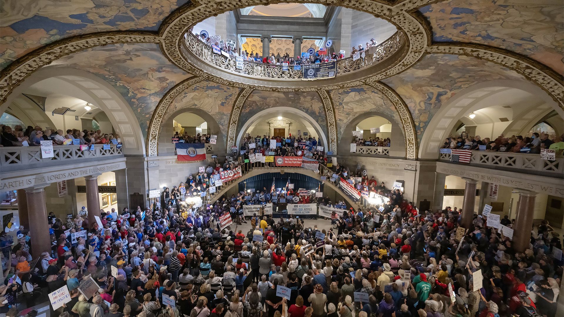 People gather at the Missouri statehouse in Jefferson City on Wednesday, Sept. 10, 2025, to protest the legislature's efforts to change the state's congressional district maps. The proposed change would divide Kansas City into districts that would include vast rural areas of the state.