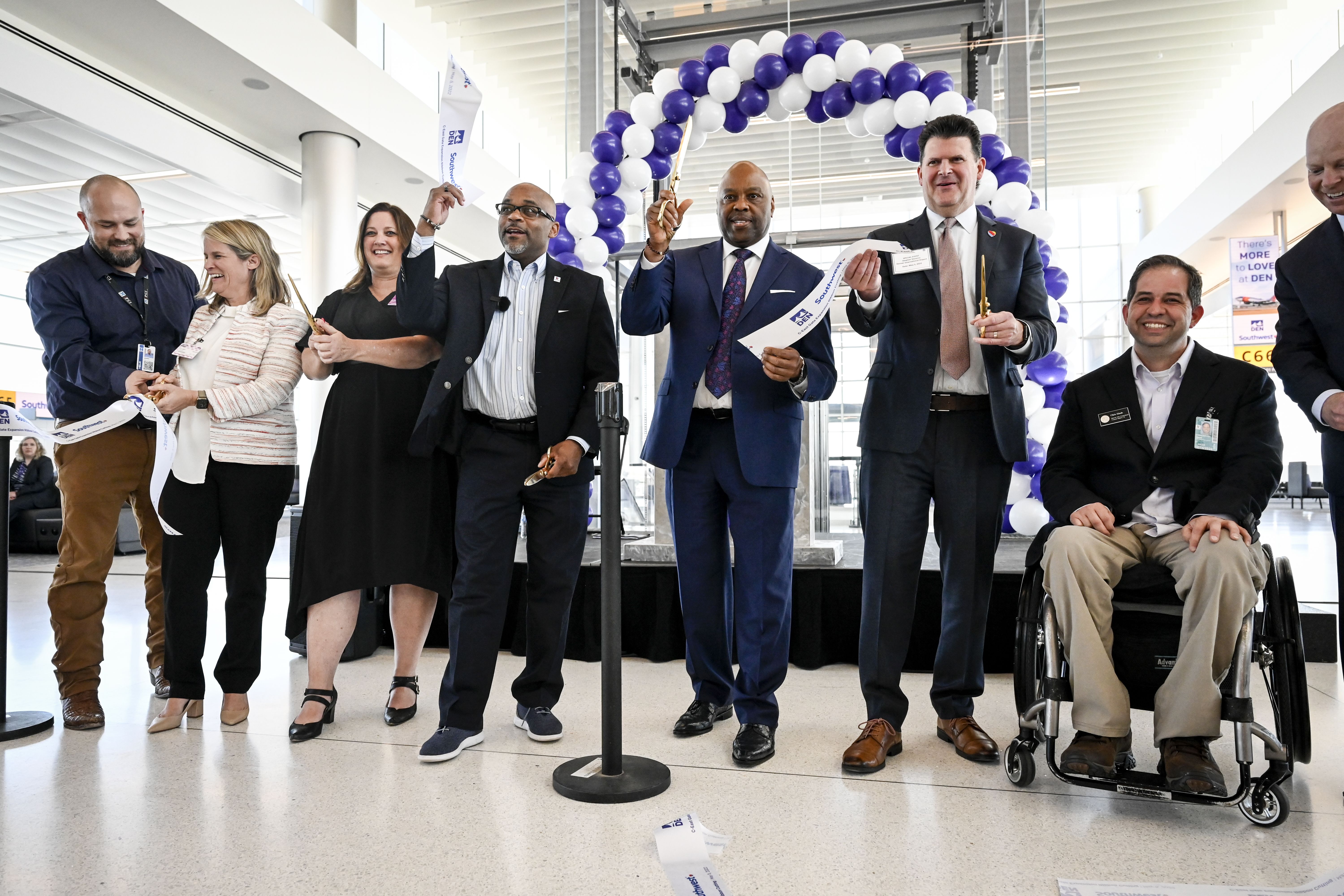 DENVER, CO - MAY 5: Mayor Michael B. Hancock and DIA CEO Phillip Washington lead a ribbon cutting during a ceremony to unveil the new C concourse addition at Denver International Airport on Thursday, May 5, 2022. (Photo by AAron Ontiveroz/MediaNews Group/The Denver Post via Getty Images)