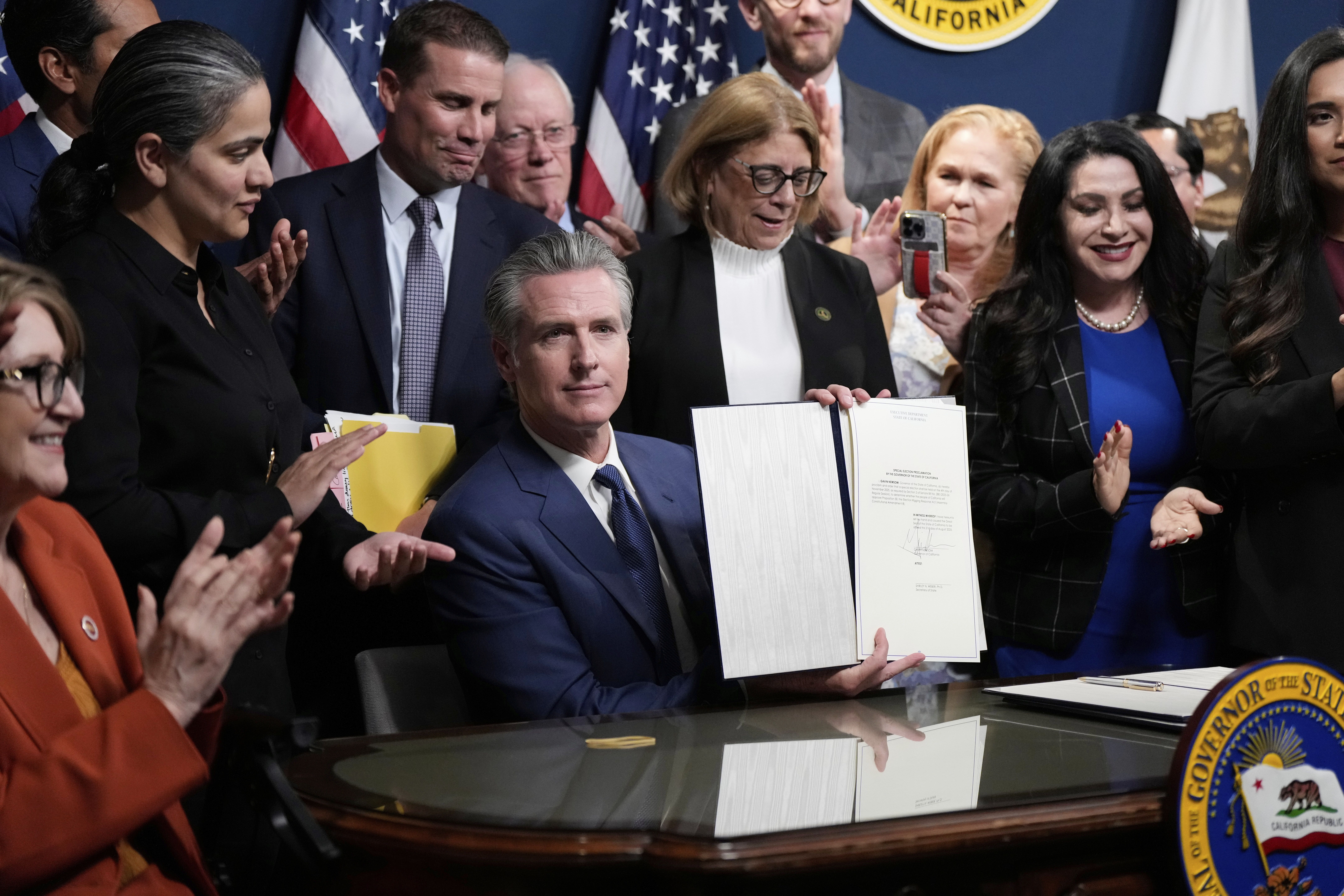 California Gov. Gavin Newsom signs legislation yesterday calling for a special election on a redrawn congressional map.