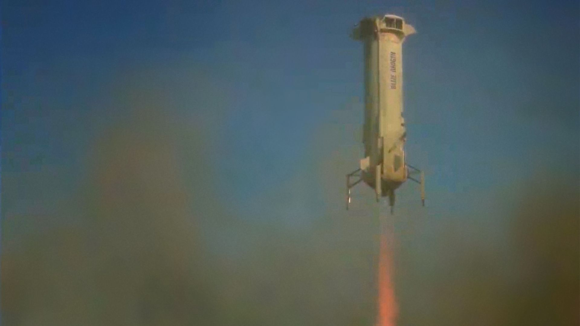 The Blue Origin New Shepard booster coming in for a landing