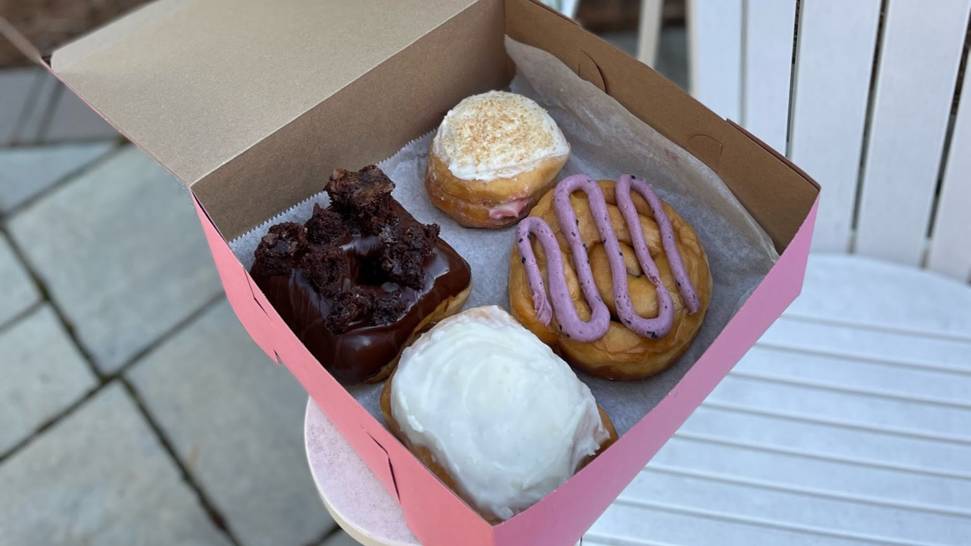 four doughnuts in a box