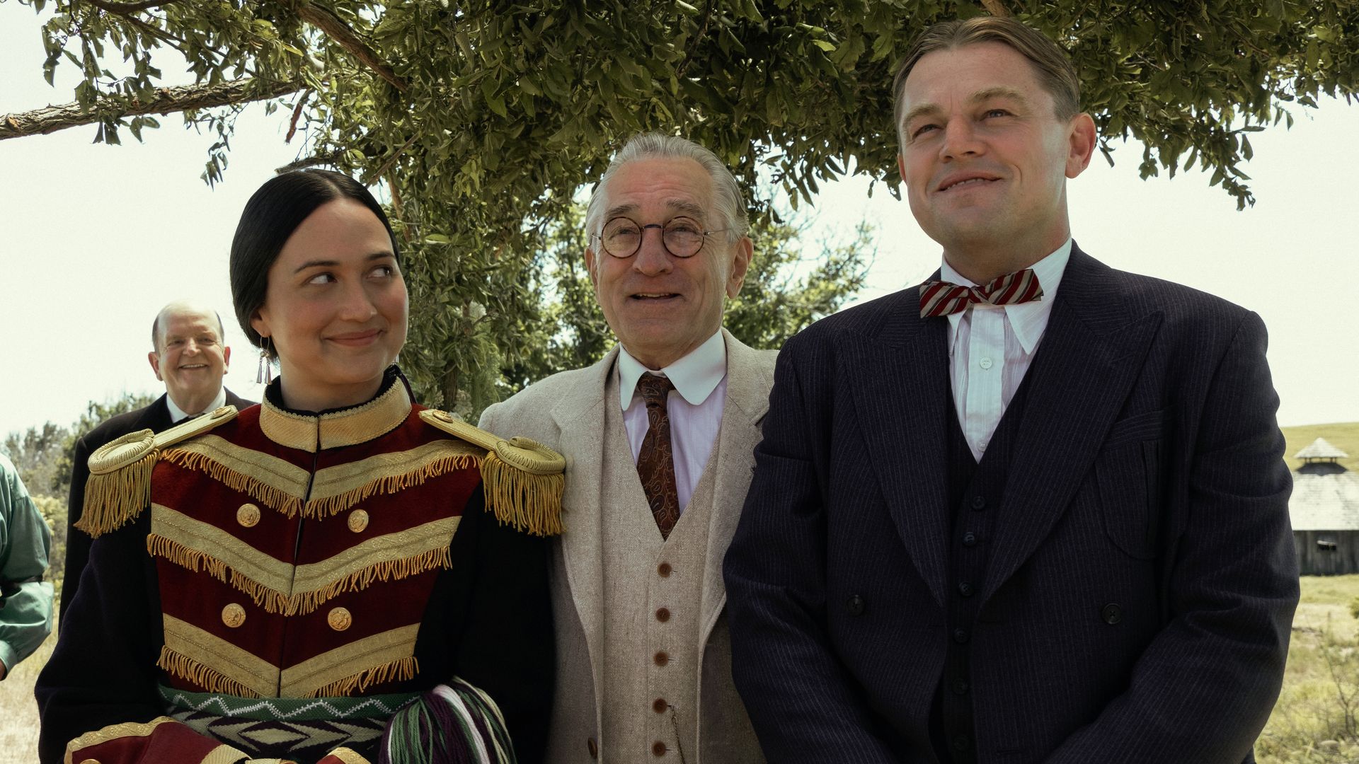 Lily Gladstone, Robert De Niro and Leonardo DiCaprio in a shot from the movie “Killers of the Flower Moon.” 