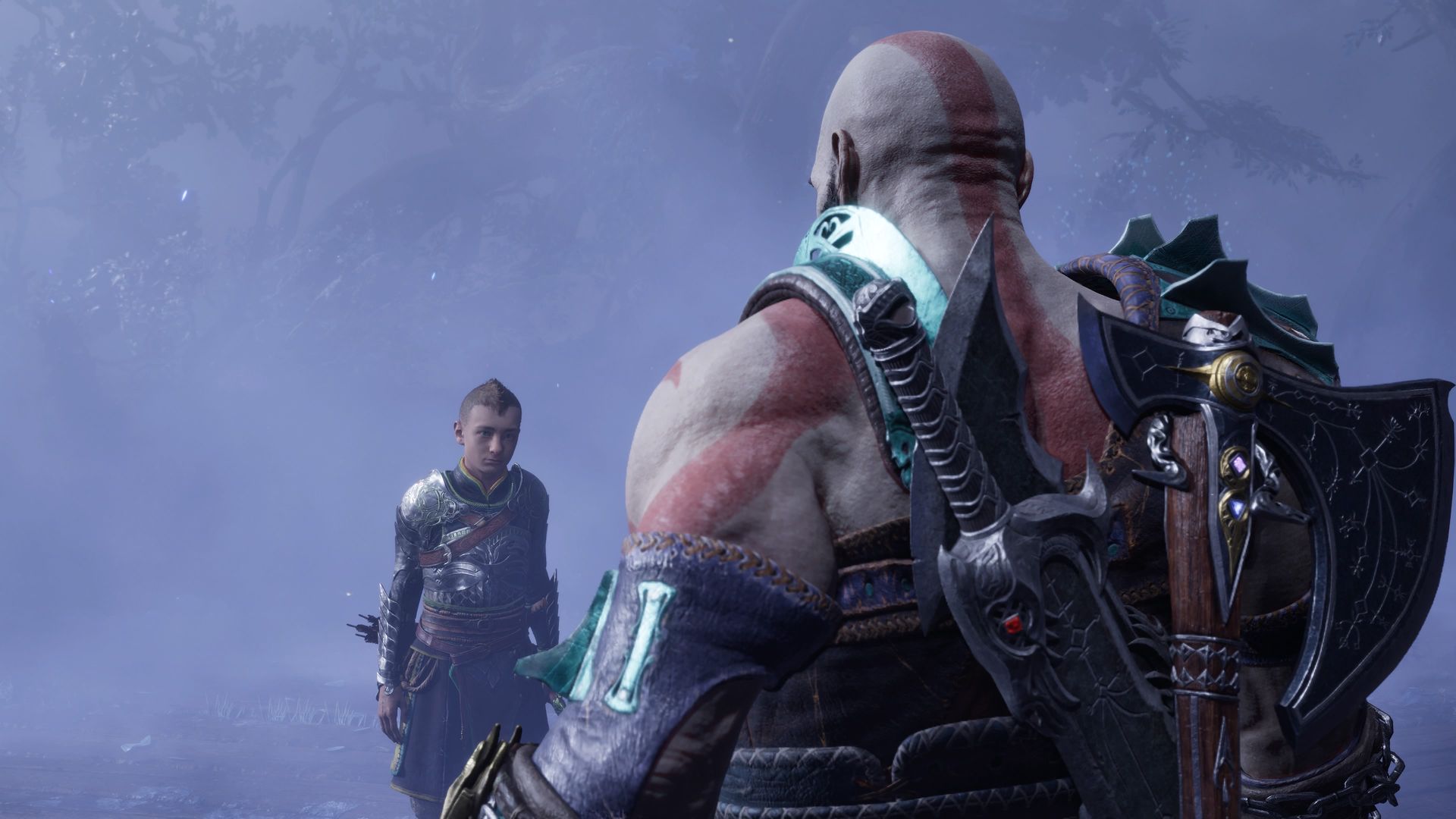 Video game screenshot of God of War protagonist Kratos with his back to the camera, facing his teenage son