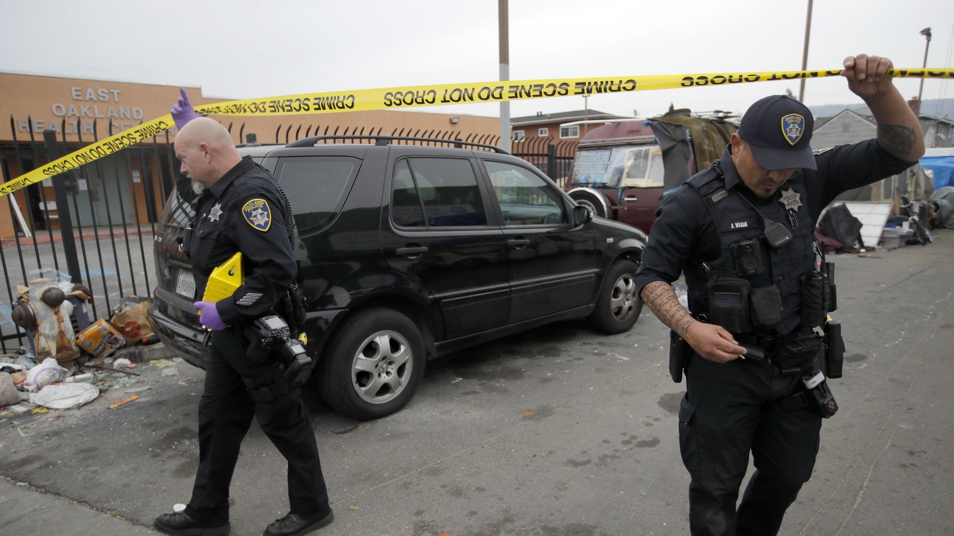 Oakland police investigate a shooting in the 1400 block of Sunshine Court near International Boulevard in East Oakland, Calif., on Dec. 26, 2023. 