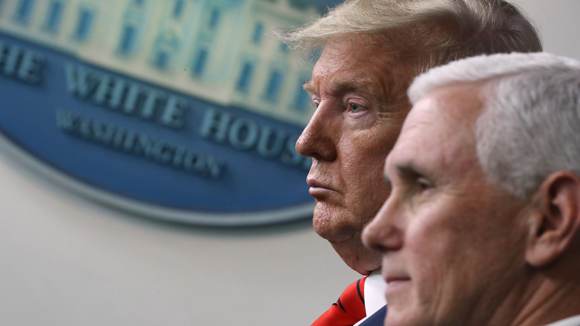 In this image, Pence and Trump stand next to each other.