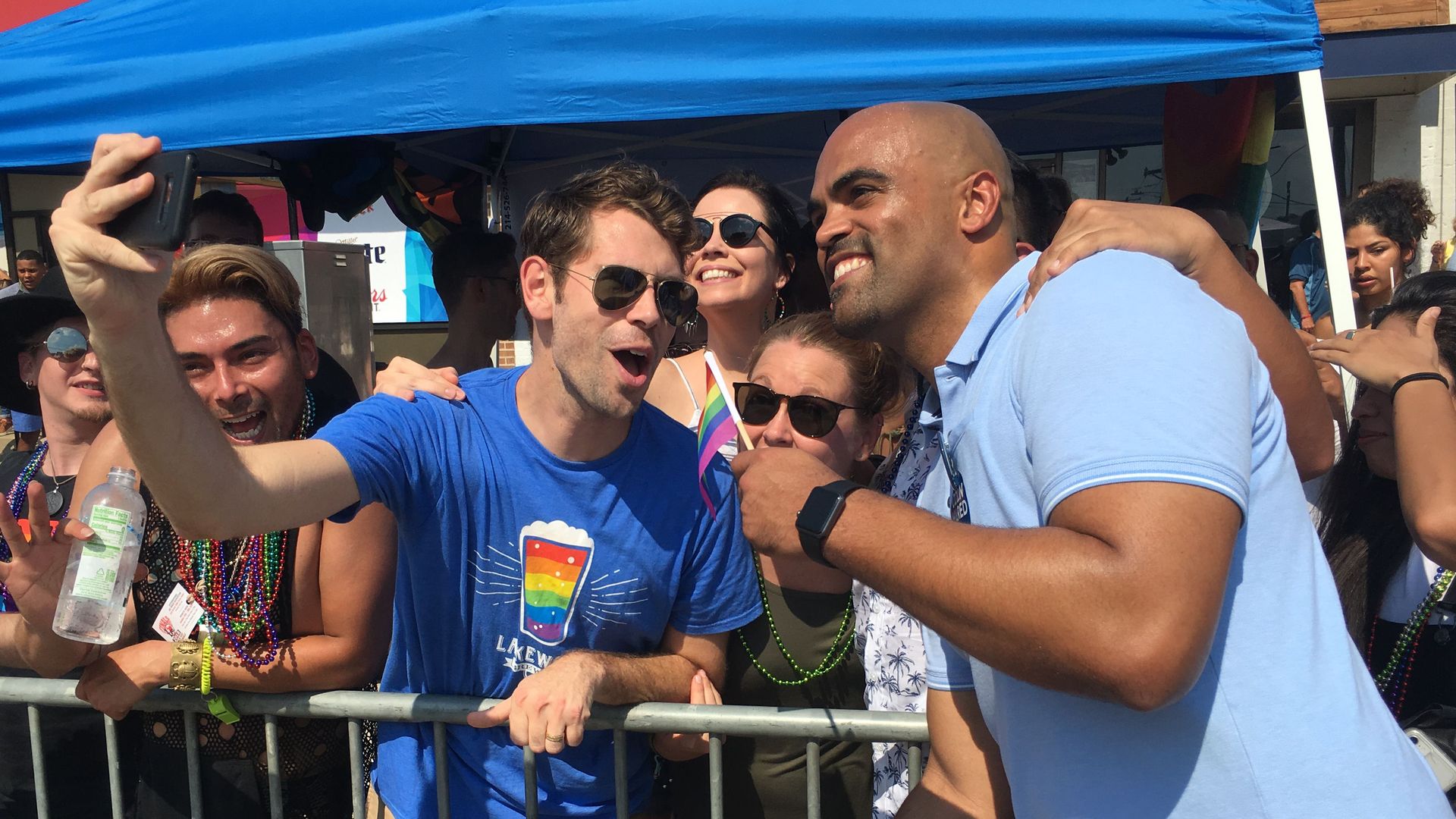 Colin Allred with a fan