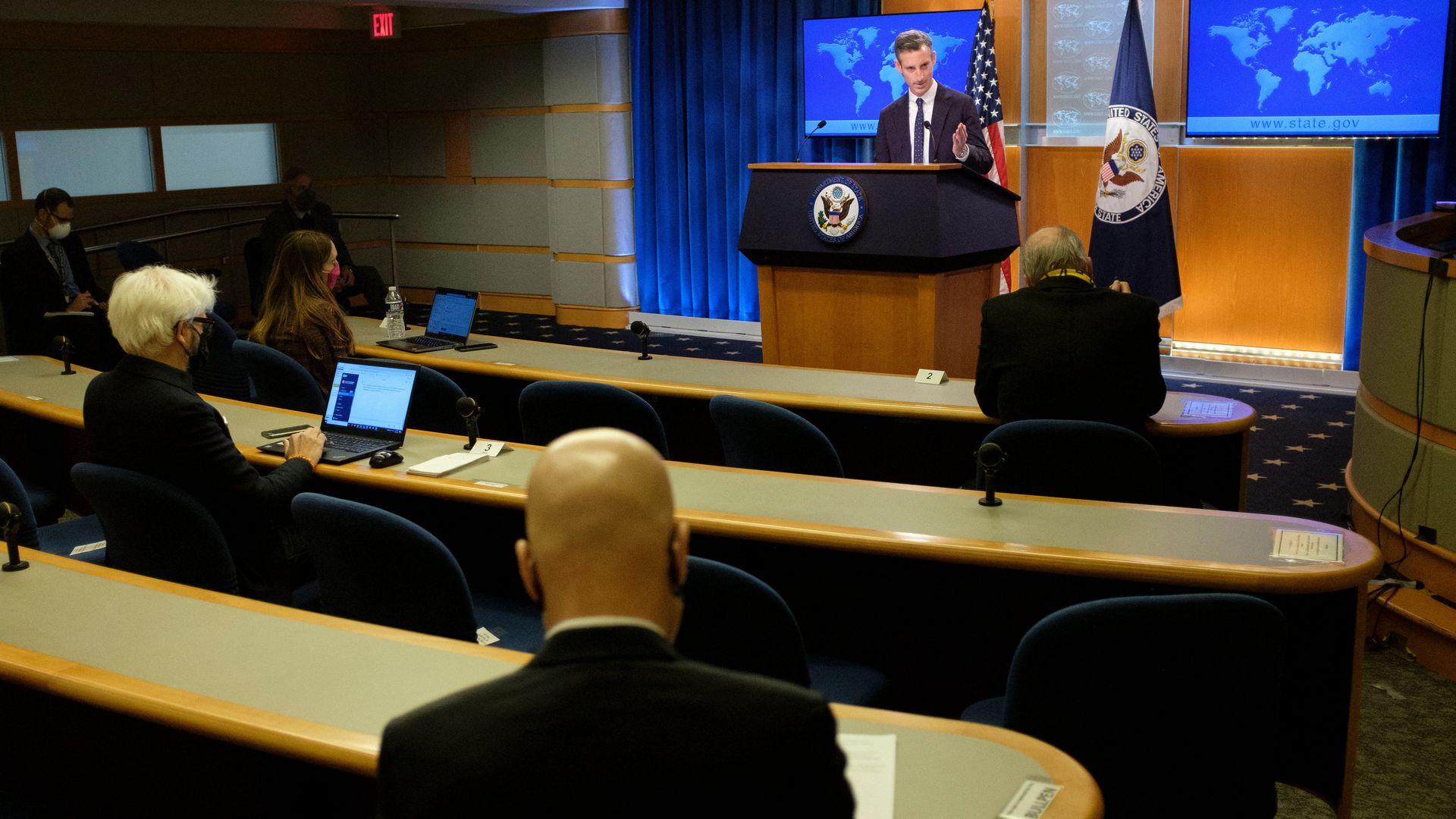 State Department spokesman Ned Price is seen speaking with Matt Lee of the Associated Press.