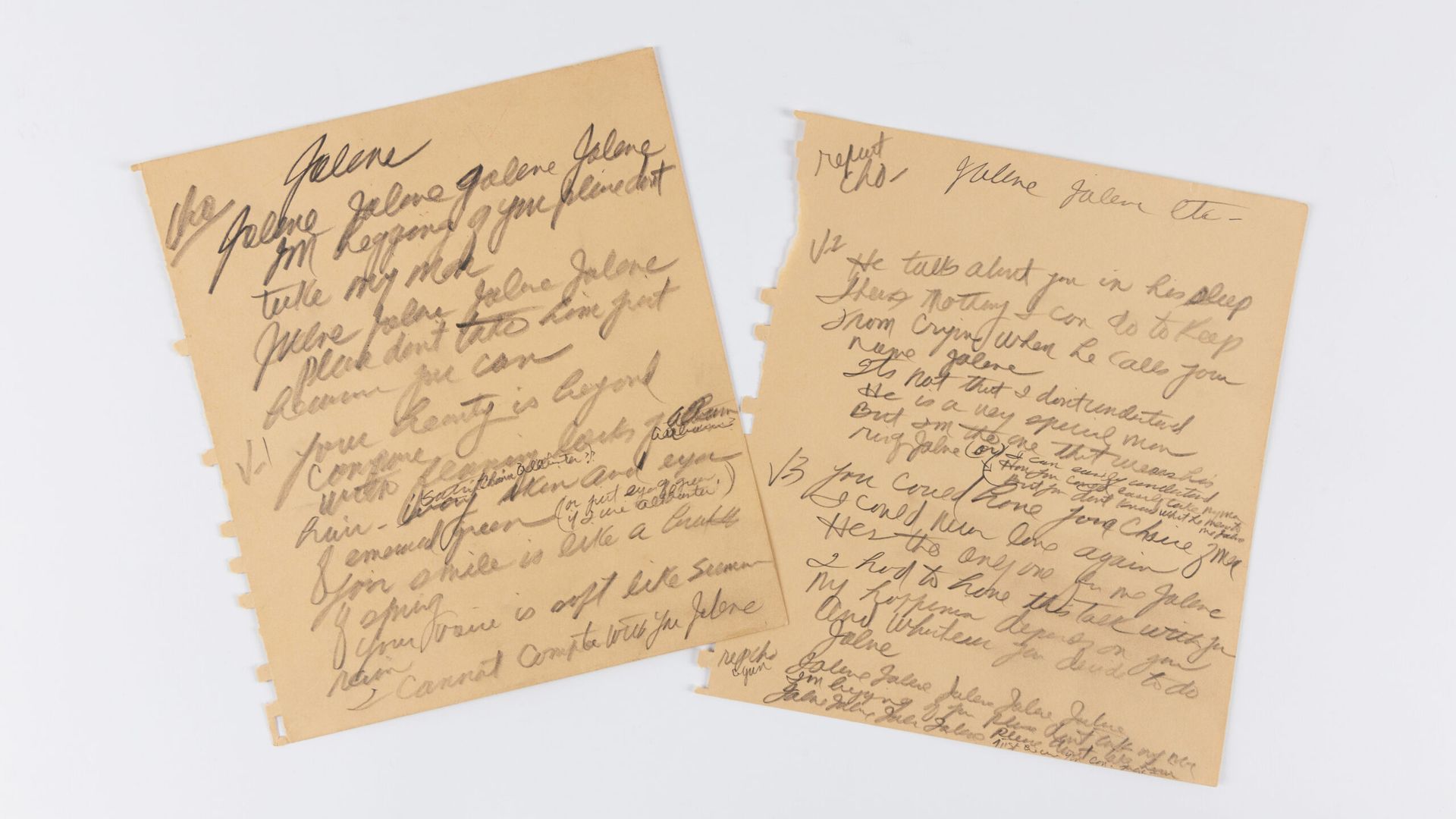 Hand-written lyrics to the song "Jolene" on aged pieces of paper.