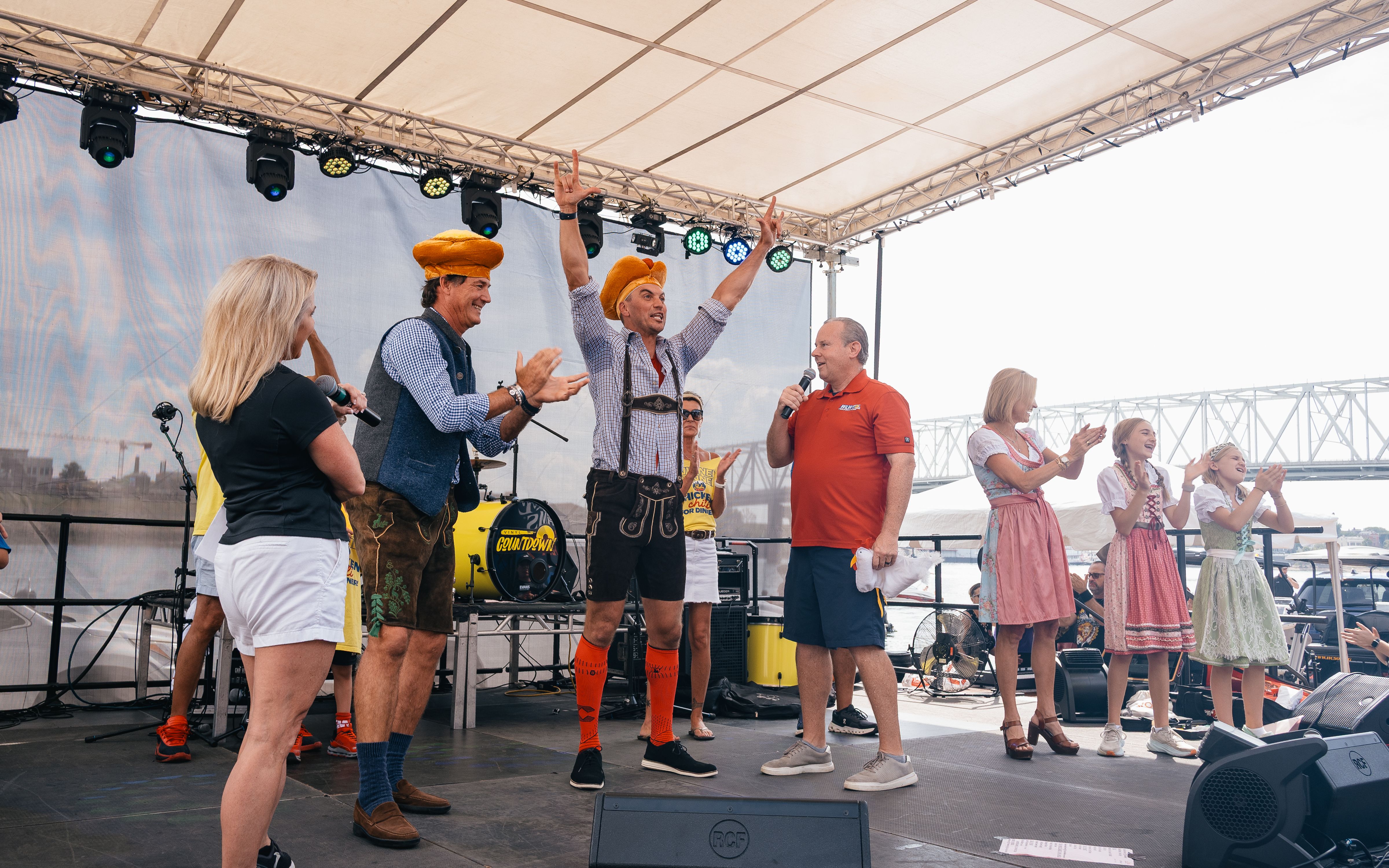 Chicken dance participants on stage in 2026.