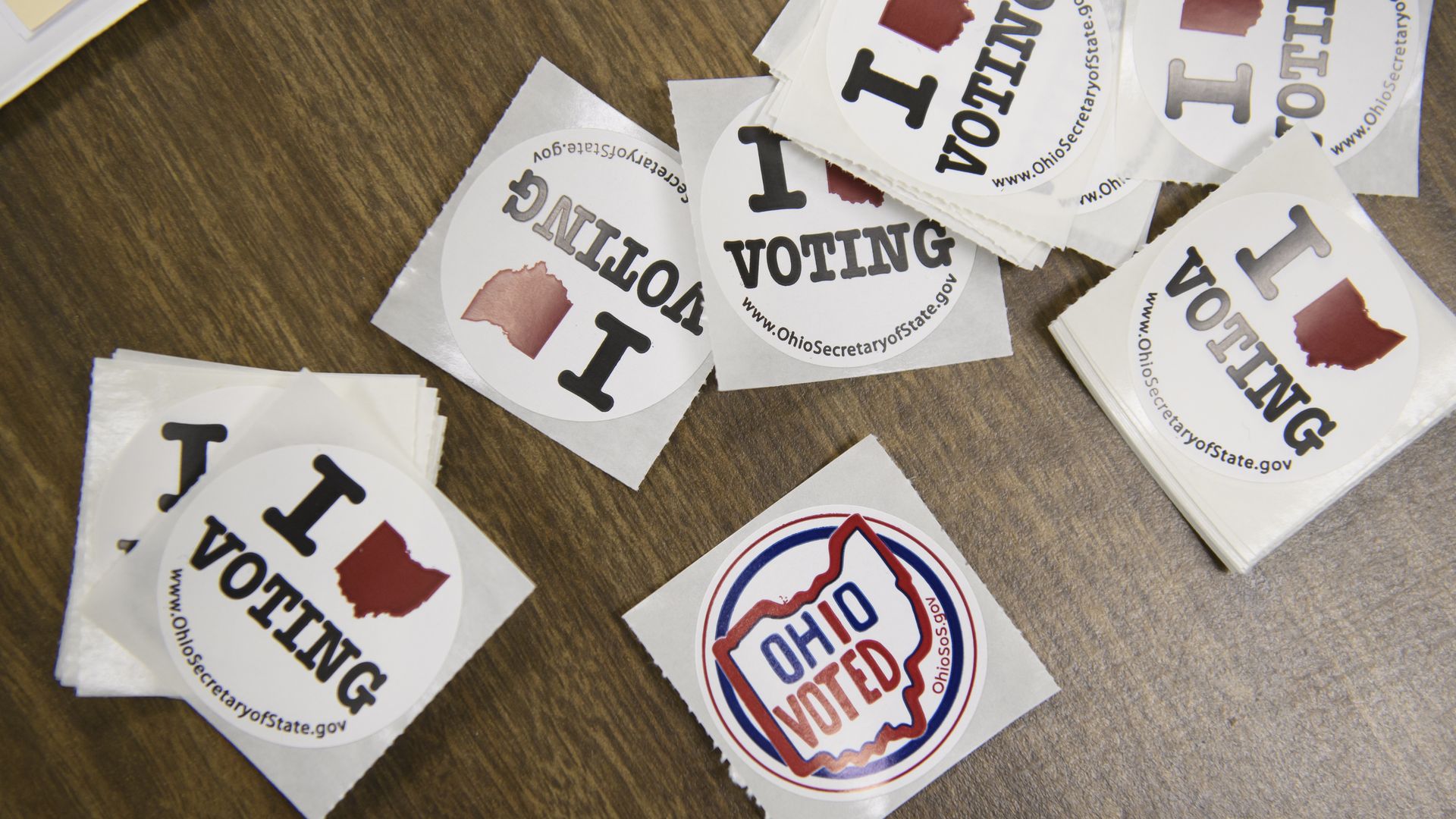 A collection of Ohio voting stickers.
