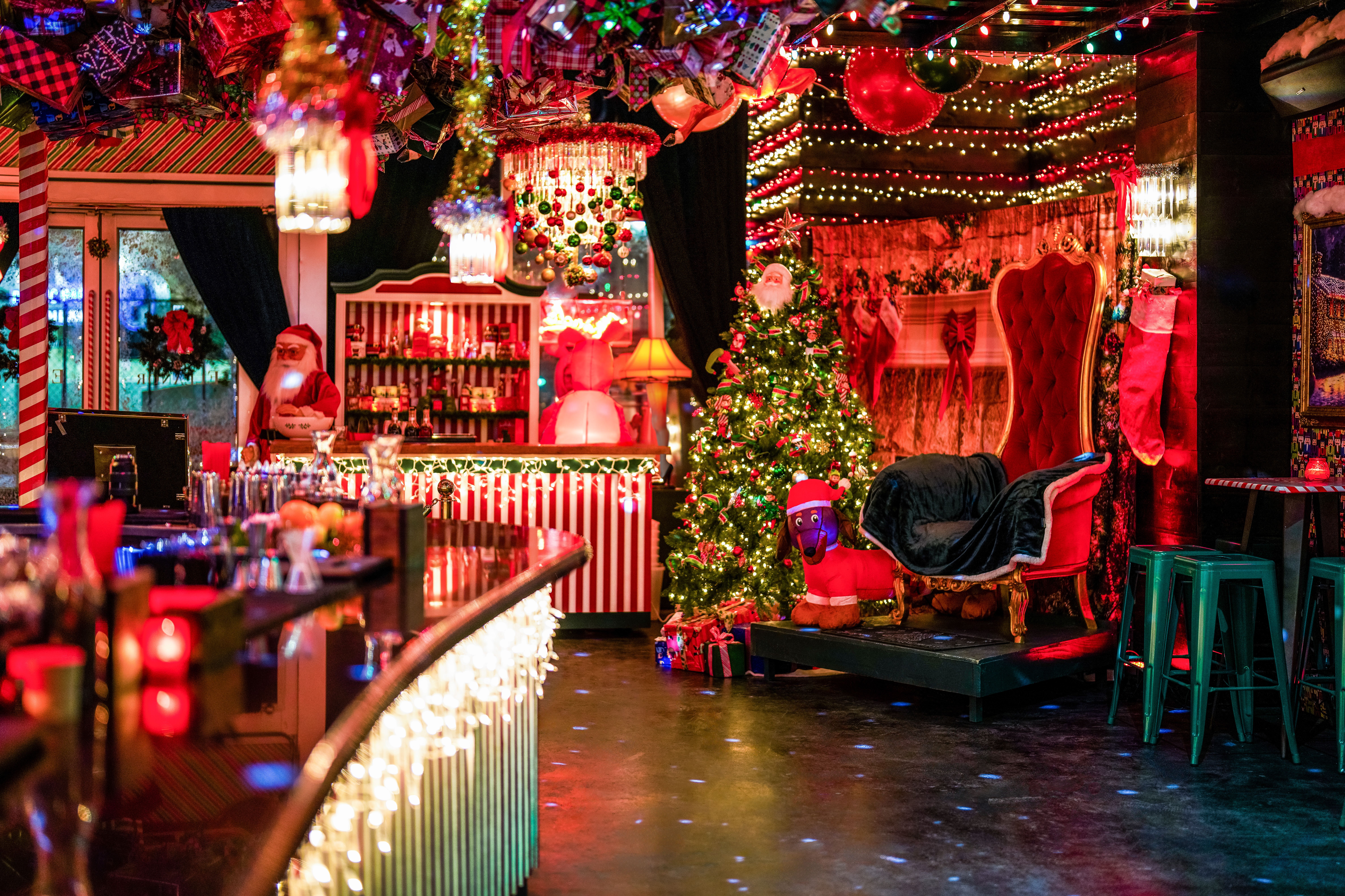 a photo of miracle's interior bar with neon lights
