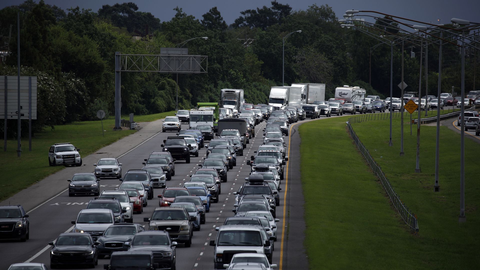 Motorists sit in traffic on I-10 West while evacuating ahead of Hurricane Ida in Metairie, Louisiana, U.S., on Saturday, Aug. 28