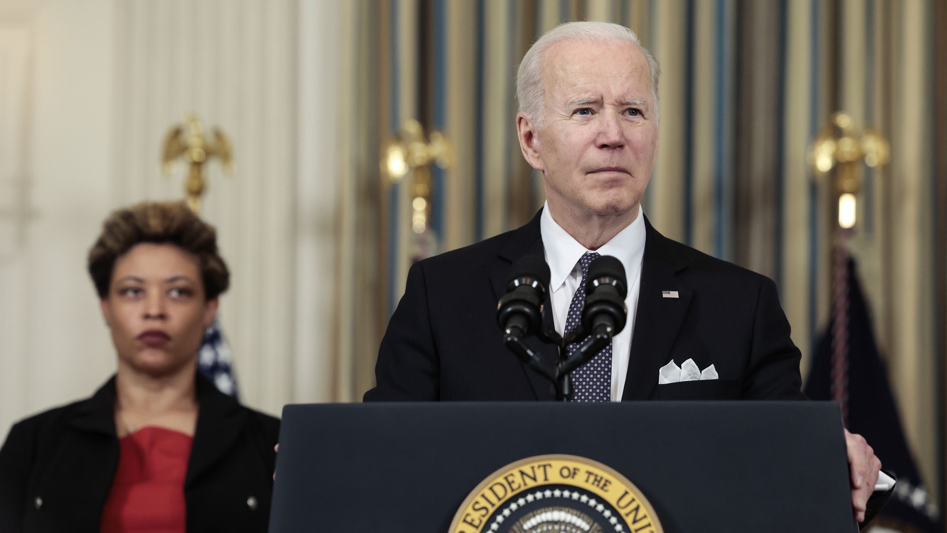 President Joe Biden speaks alongside Director of the Office of Management and Budget Shalanda Young as he introduces his budget request for fiscal year 2023 in the State Dining Room of the White House on March 28, 2022 in Washington, DC. 