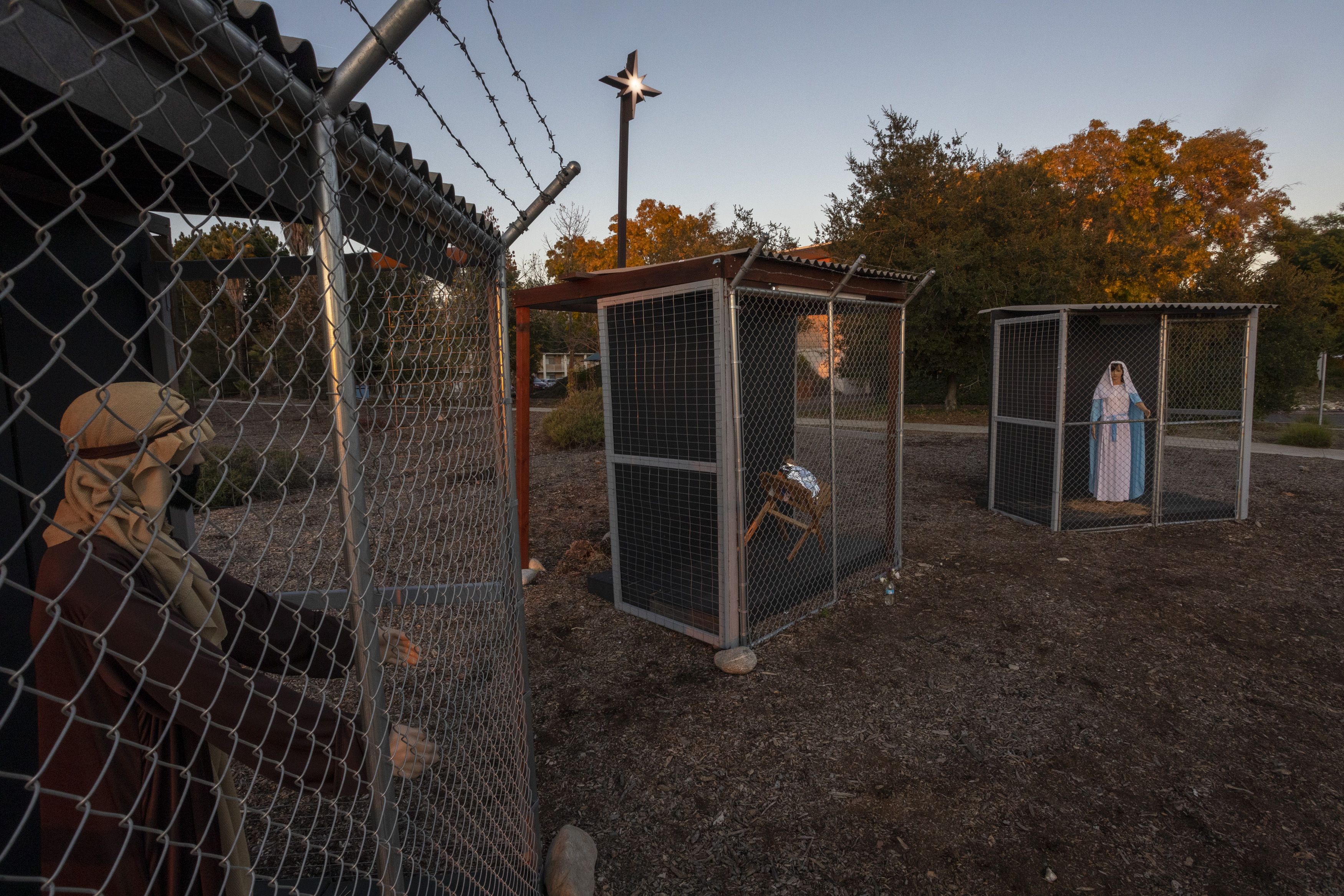 A nativity scene depicts Jesus, Mary, and Joseph separated and caged, as asylum seekers detained by U.S. immigration officials at Claremont United Methodist Church in Claremont, California.