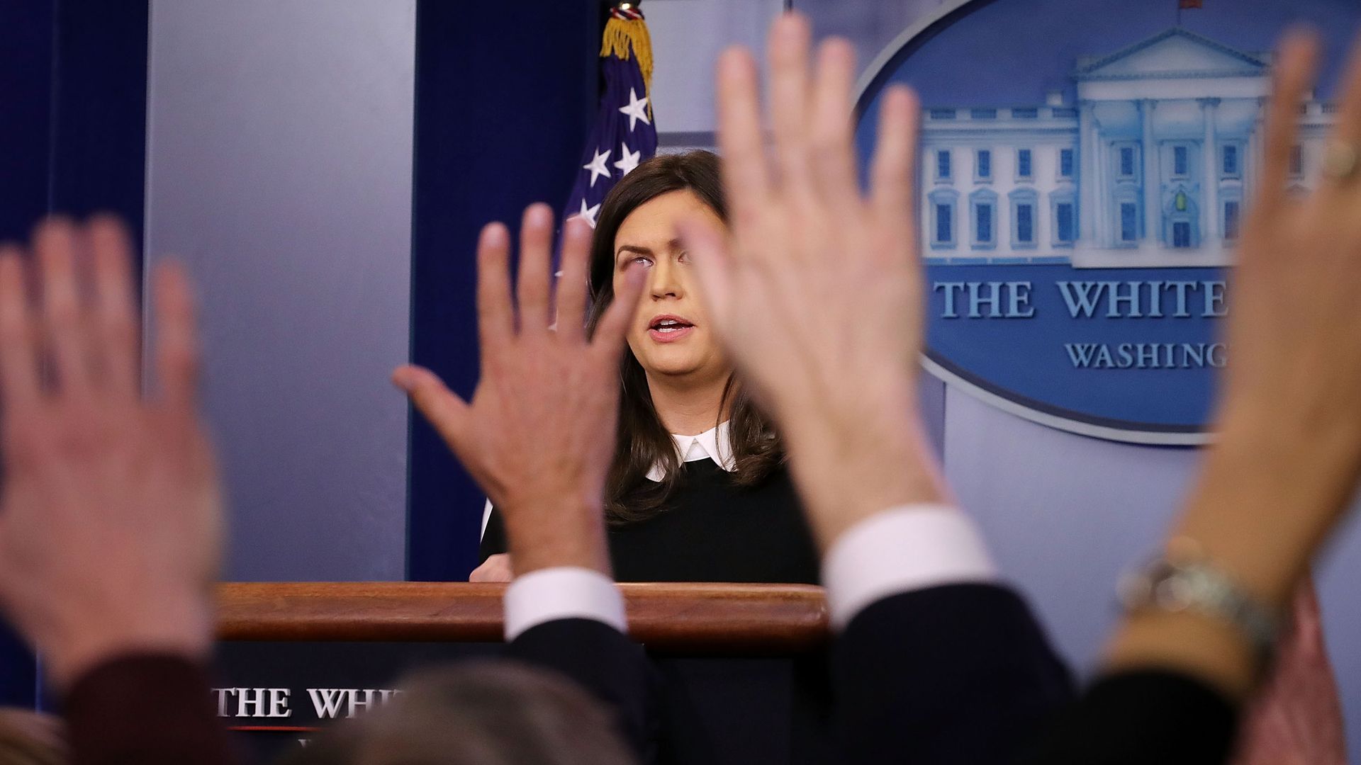 Sarah Sanders takes questions during the White House press briefing.