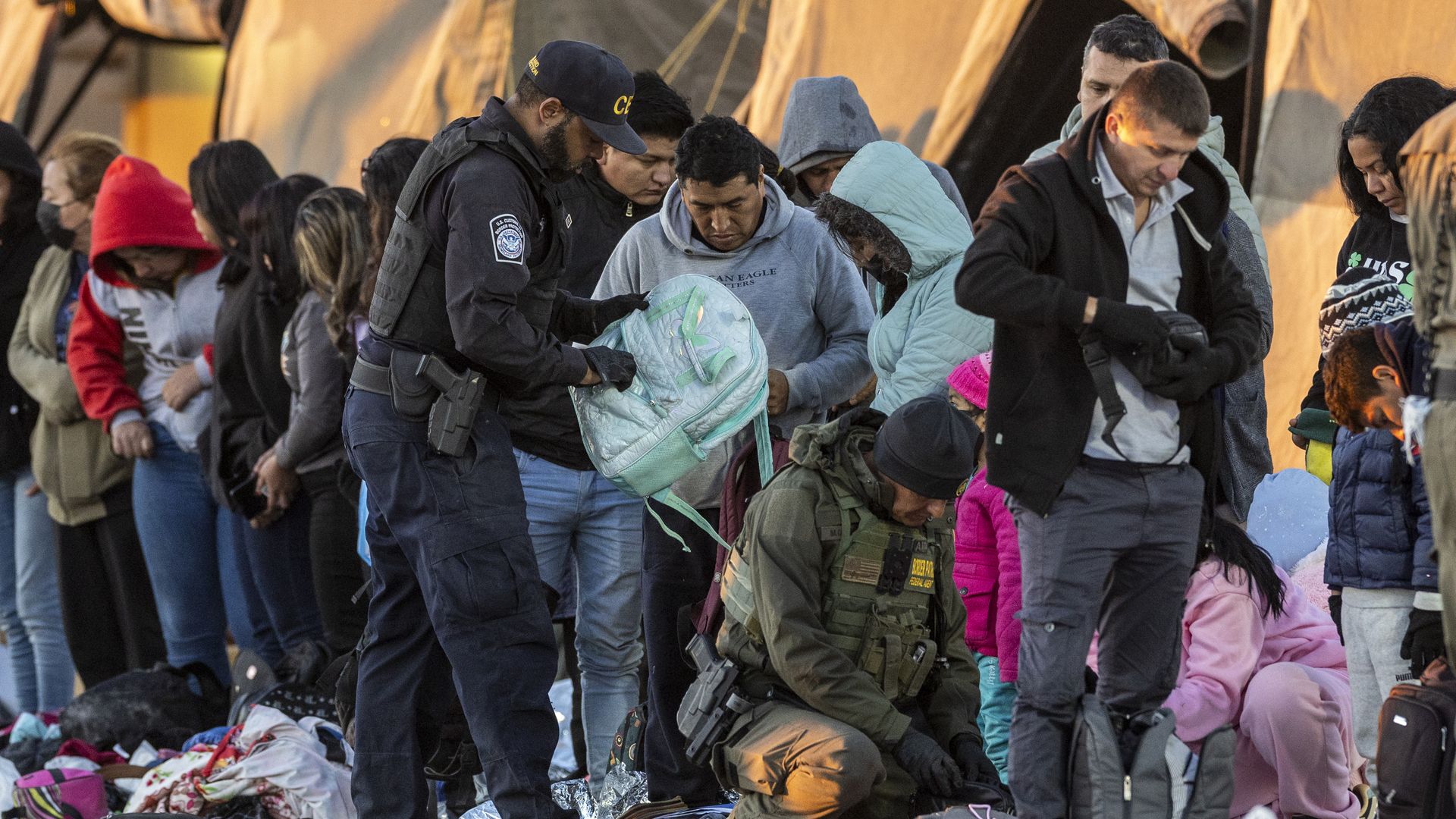 U.S. Customs and Border Protection agents processing people near the U.S.-Mexico border on Dec. 8.