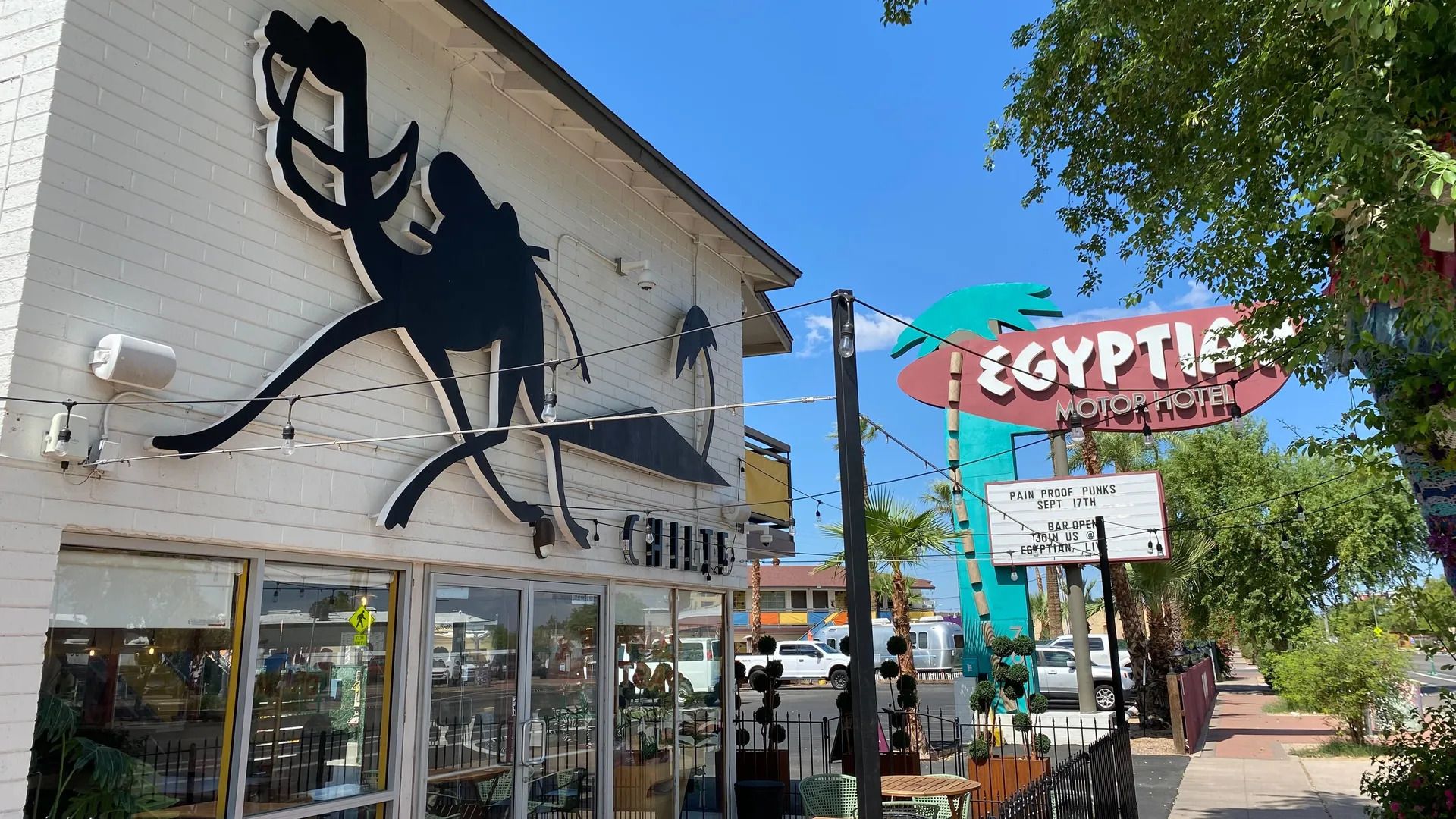 A building with a camel design above the front door.