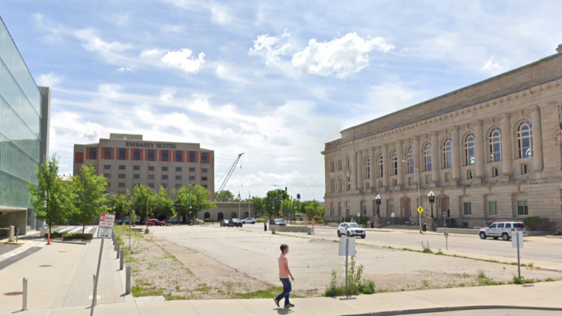 A photo of the empty lot adjacent to Des Moines City Hall.