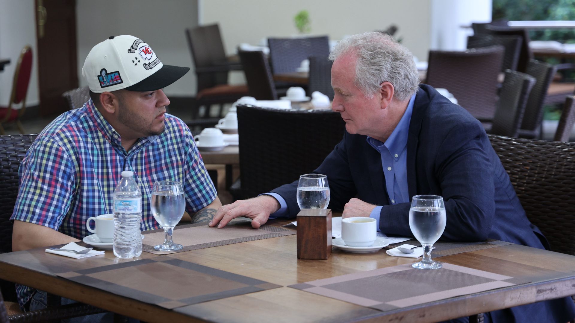 U.S. Sen. Chris Van Hollen (D-MD) meets with Kilmar Armando Abrego Garcia (L) at an undisclosed location on April 17, 2025 in San Salvador, El Salvador. 