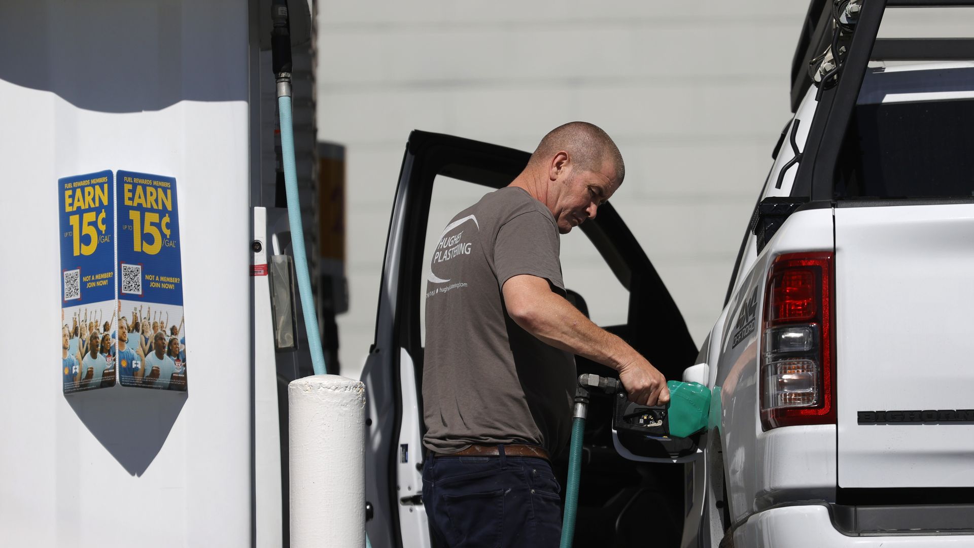 A customer pumps gas into his truck at a Shell station on October 12, 2021 in San Francisco, California.