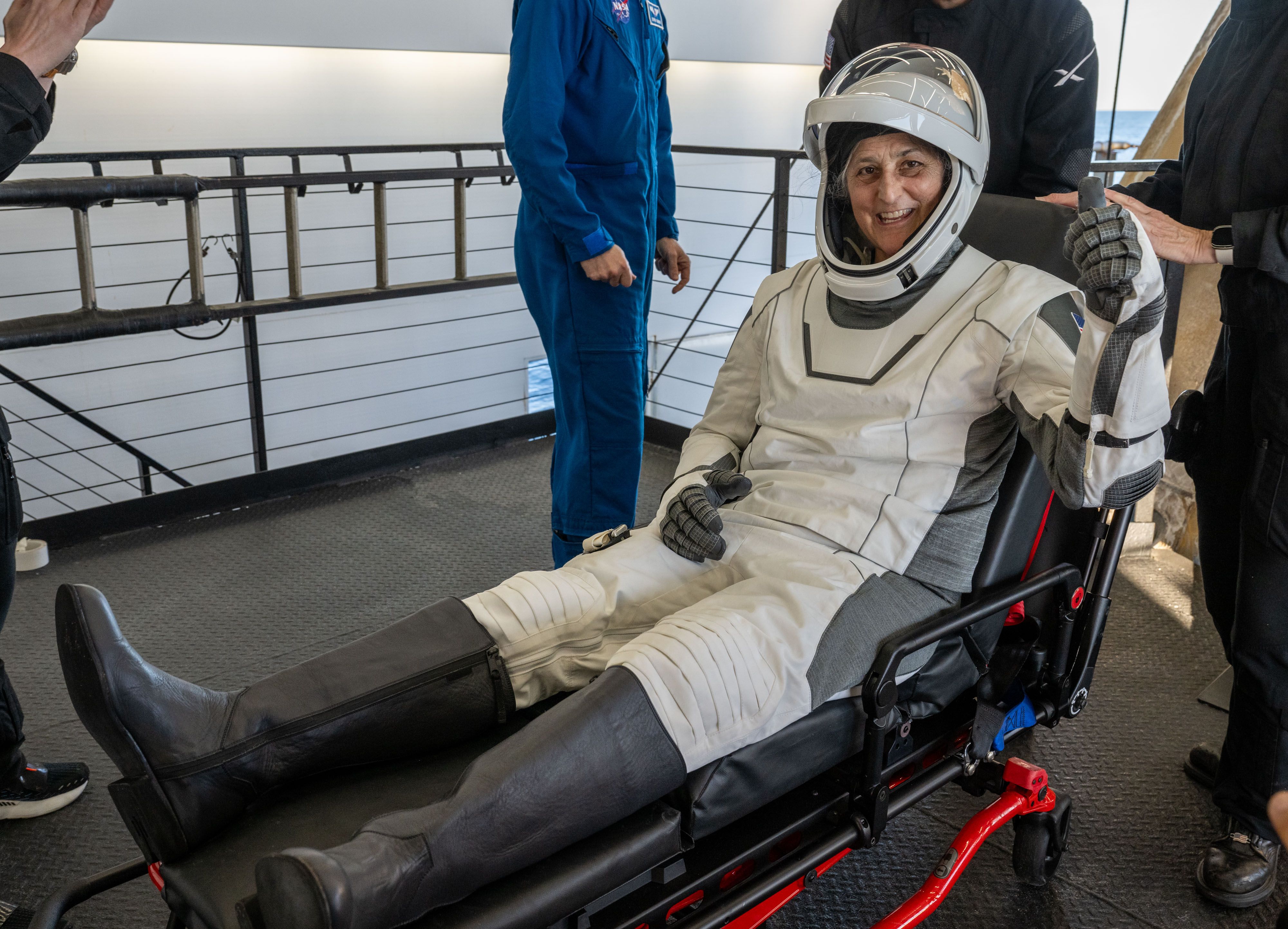 NASA astronaut Suni Williams is helped out of the SpaceX Crew Dragon capsule yesterday.
