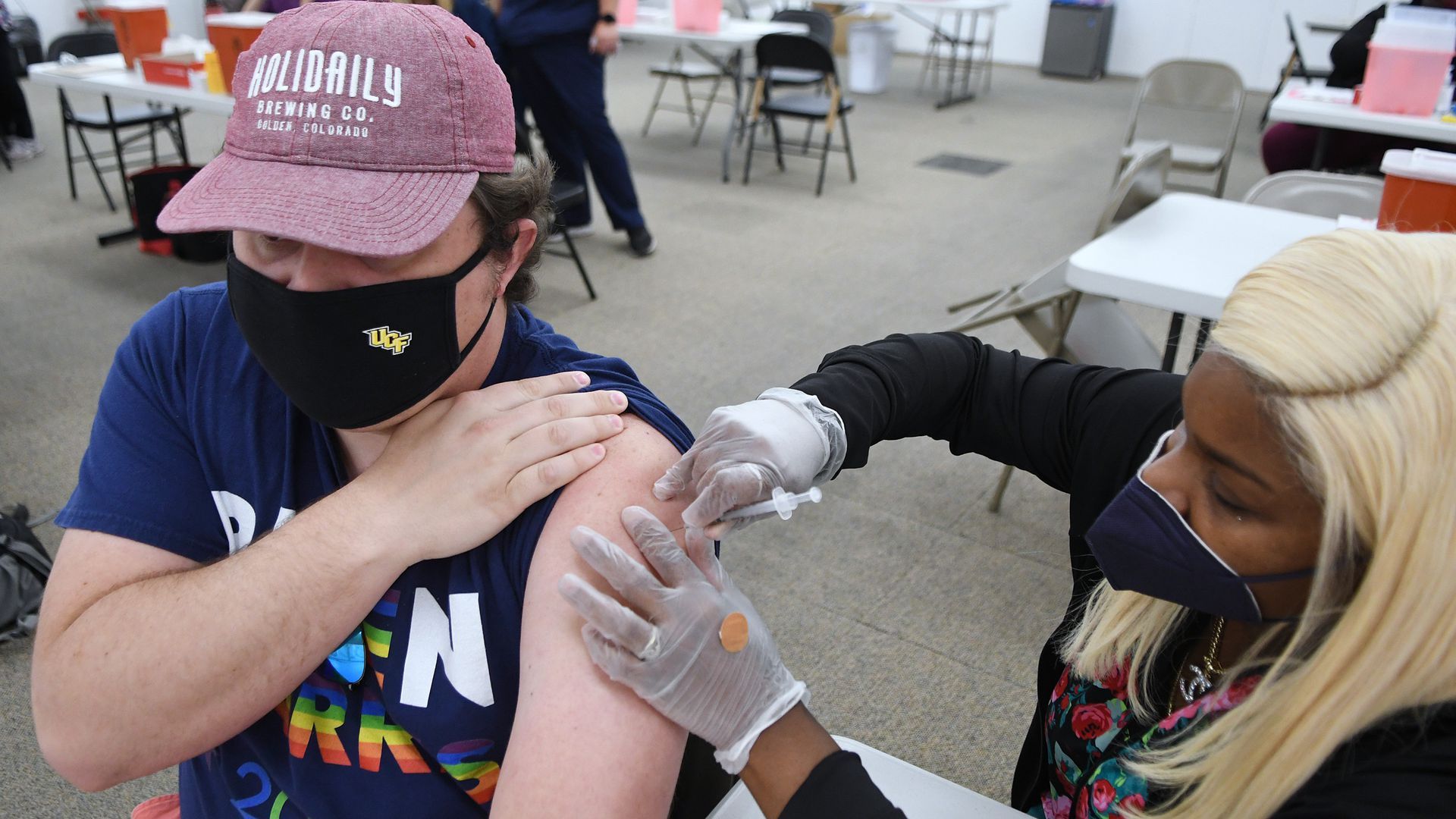 A man receives a coronavirus vaccine shot in Florida.